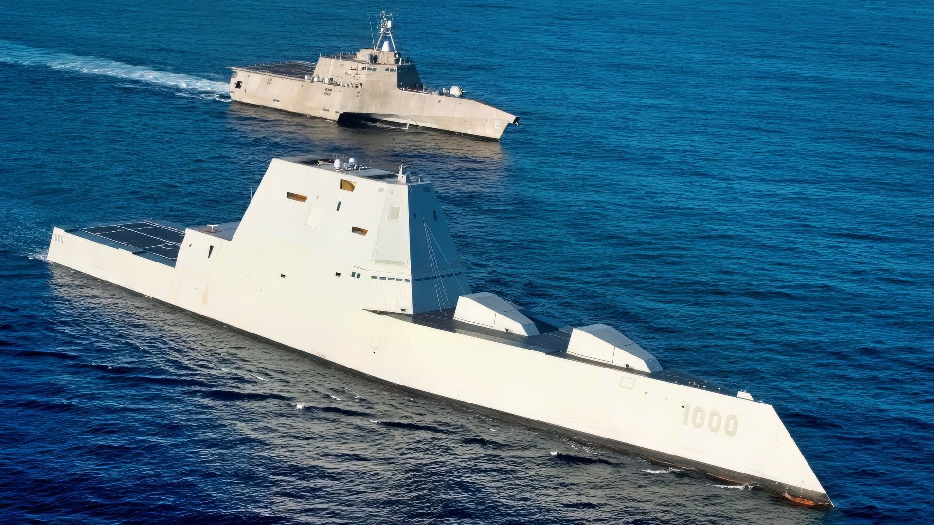 Dec. 8, 2016) The guided-missile destroyer USS Zumwalt (DDG 1000), left, the Navy's most technologically advanced surface ship, is underway in formation with the littoral combat ship USS Independence (LCS 2) on the final leg of its three-month journey to its new homeport in San Diego. Upon arrival, Zumwalt will begin installation of its combat systems, testing and evaluation, and operation integration with the fleet. (U.S. Navy photo by Petty Officer 1st Class Ace Rheaume/Released)