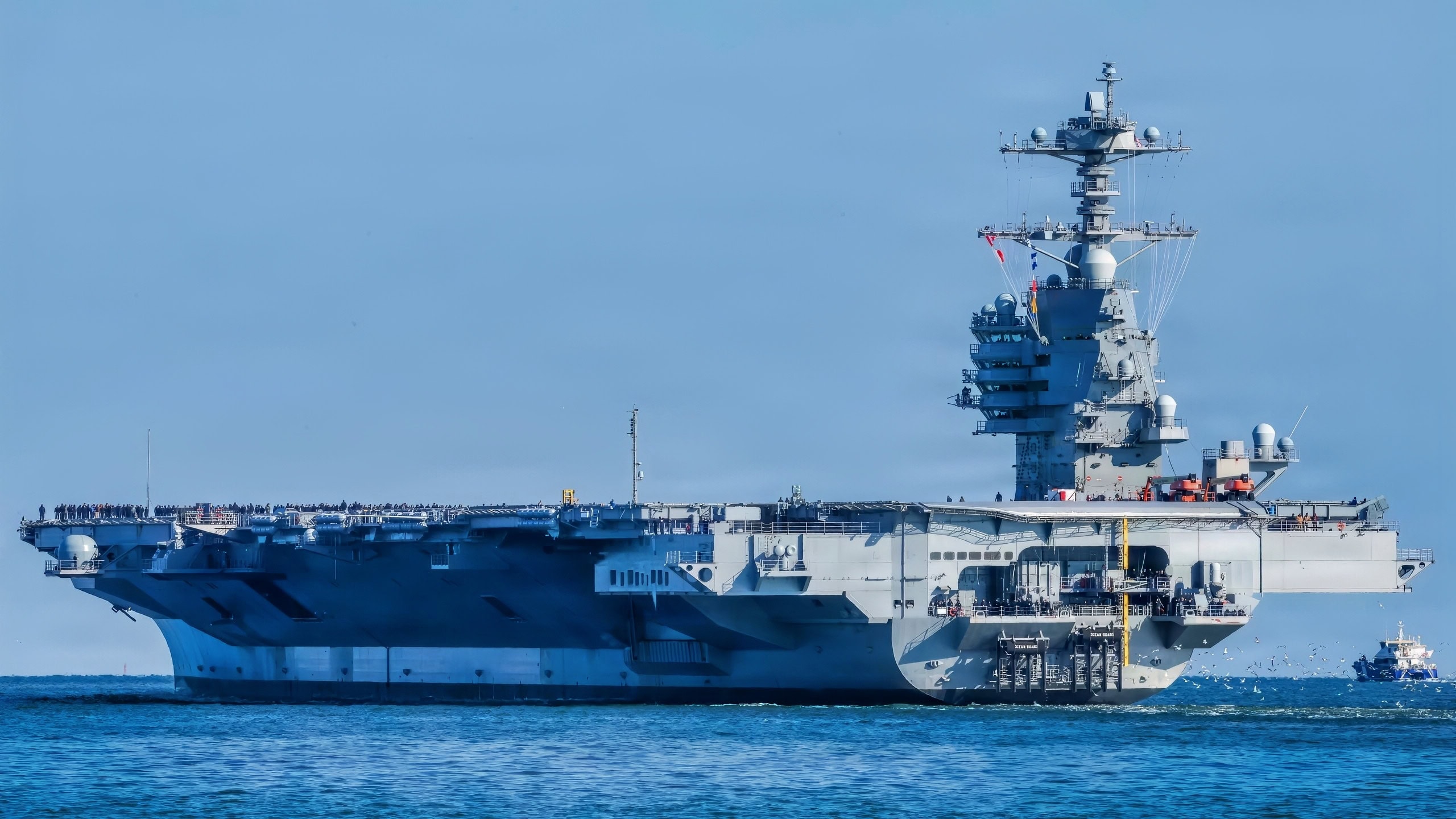 Pre-Commissioning Unit John F. Kennedy (CVN 79) transits the James River as the ship departs for Builder’s Trials, Jan. 28, 2026. Builder’s Trials provide an opportunity to test ship systems and components at sea for the first time, and make required adjustments prior to additional underway testing. (U.S. Navy photo by Mass Communication Specialist Seaman Jayden Howard)