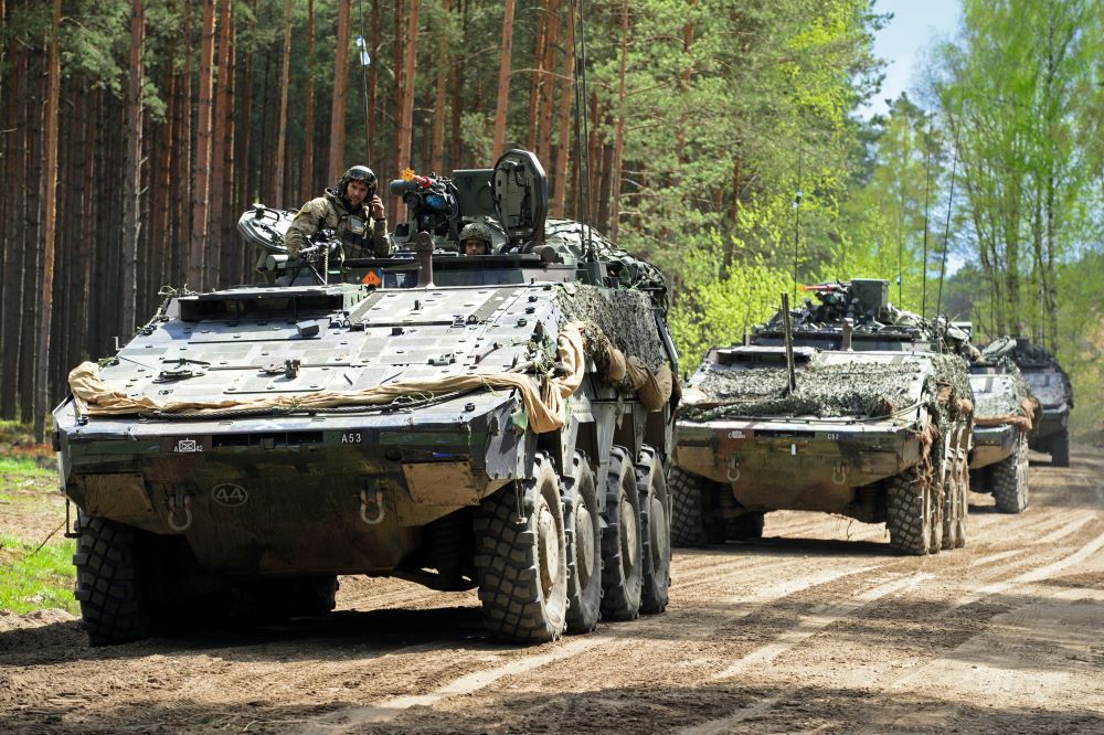 GTK Boxer armored vehicles of the German Bundeswehr on a forest road