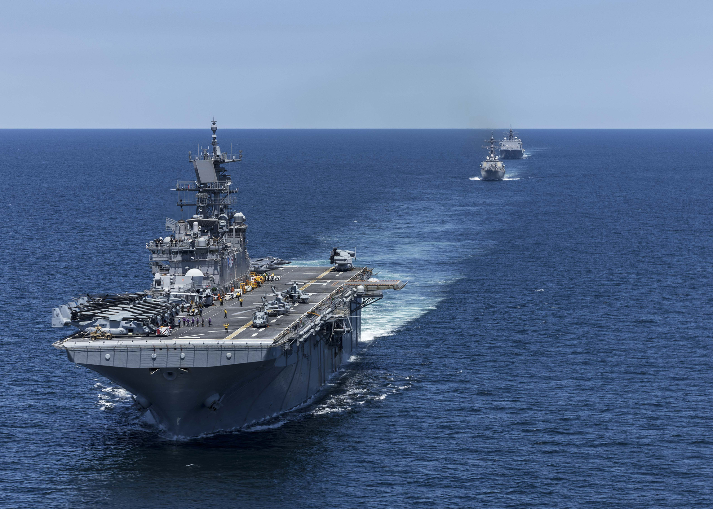 ATLANTIC OCEAN (May 22, 2025) The Wasp-class amphibious assault ship USS Iwo Jima (LHD 7), the Arleigh Burke-class guided missile destroyer USS Gonzalez (DDG 66), and the San Antonio-class amphibious transport dock ships USS Fort Lauderdale (LPD 28) sail in formation during a simulated strait transit. The Iwo Jima Amphibious Ready Group (ARG) and 22nd Marine Expeditionary Unit (MEU) are conducting ARGMEUEX which prepares integrated naval task forces for sustained, high-end Joint and combined combat. Integrated naval training provides combatant commanders and the Commander-in-Chief highly capable forces that deter adversaries, underpin American security and economic prosperity, and reassure Allies and partners. (U.S. Navy photo by Mass Communication Specialist Seaman Andrew Eggert)