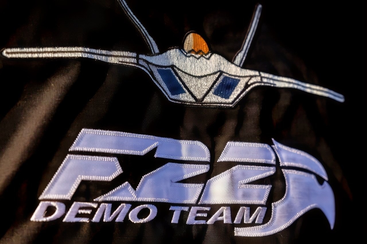 The F-22 Raptor Demonstration Team uniform is worn during a practice demonstration at Langley Air Force Base, Virginia, Nov. 13, 2025. The all-black flight suit is a signature look for Air Combat Command demonstration teams. (U.S. Air Force photo by Staff Sgt. Lauren Cobin)