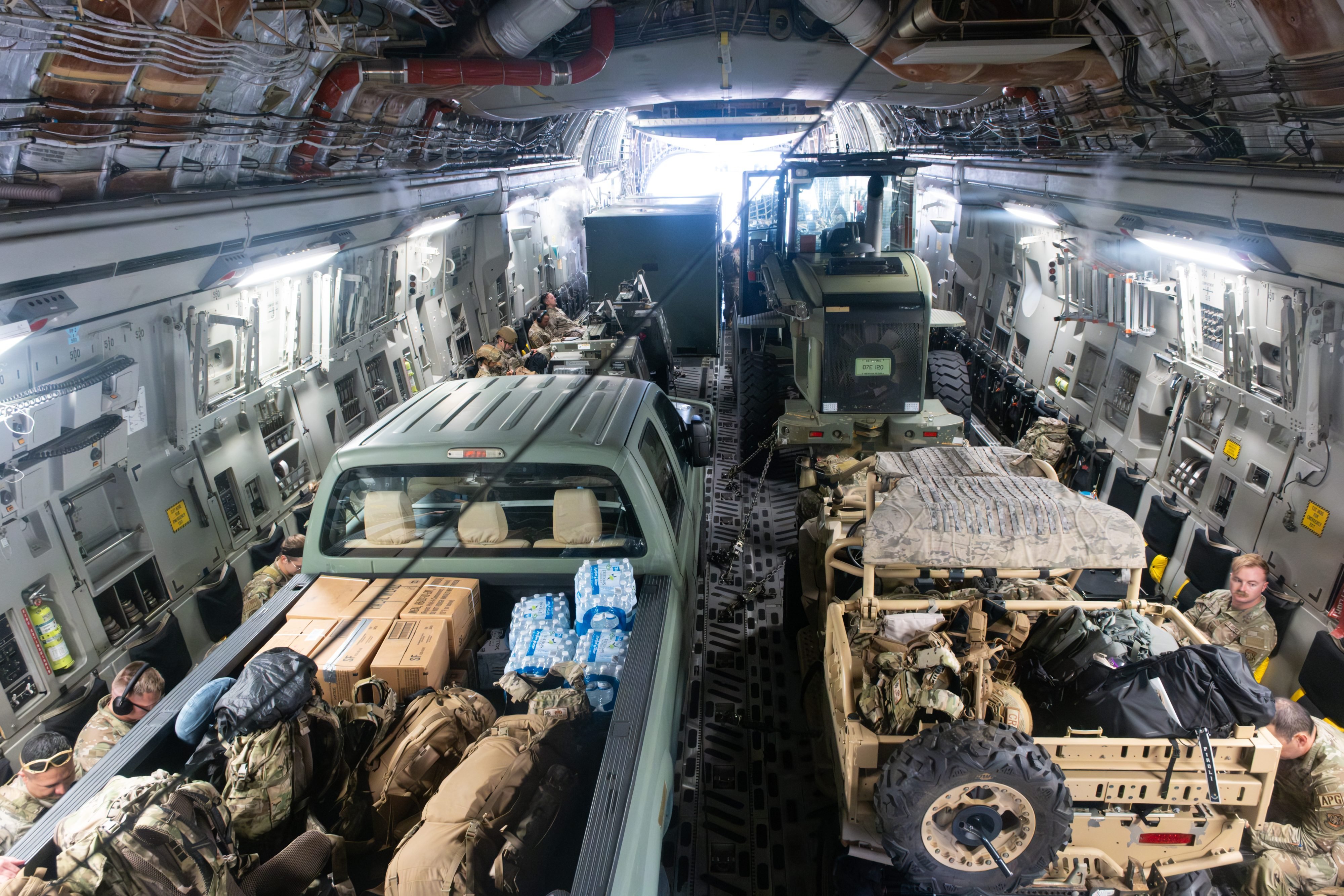 U.S. Air Force Airmen assigned to the 621st Contingency Response Wing mobilize a Contingency Response Element and board a C-17 Globemaster III in support of Venezuela’s disaster relief response at Joint Base McGuire-Dix-Lakehurst, New Jersey, June 27, 2026. At the direction of U.S. Southern Command, assigned U.S. military forces are supporting Department of State-led U.S. disaster assistance to the people of Venezuela in the aftermath of the June 24, 2026, earthquakes. Contingency response elements provide rapidly deployable air mobility capabilities to assess, open, operate and sustain airfields during contingency, humanitarian assistance and disaster-response operations. (U.S. Air Force photo by Capt. Michael Hong)