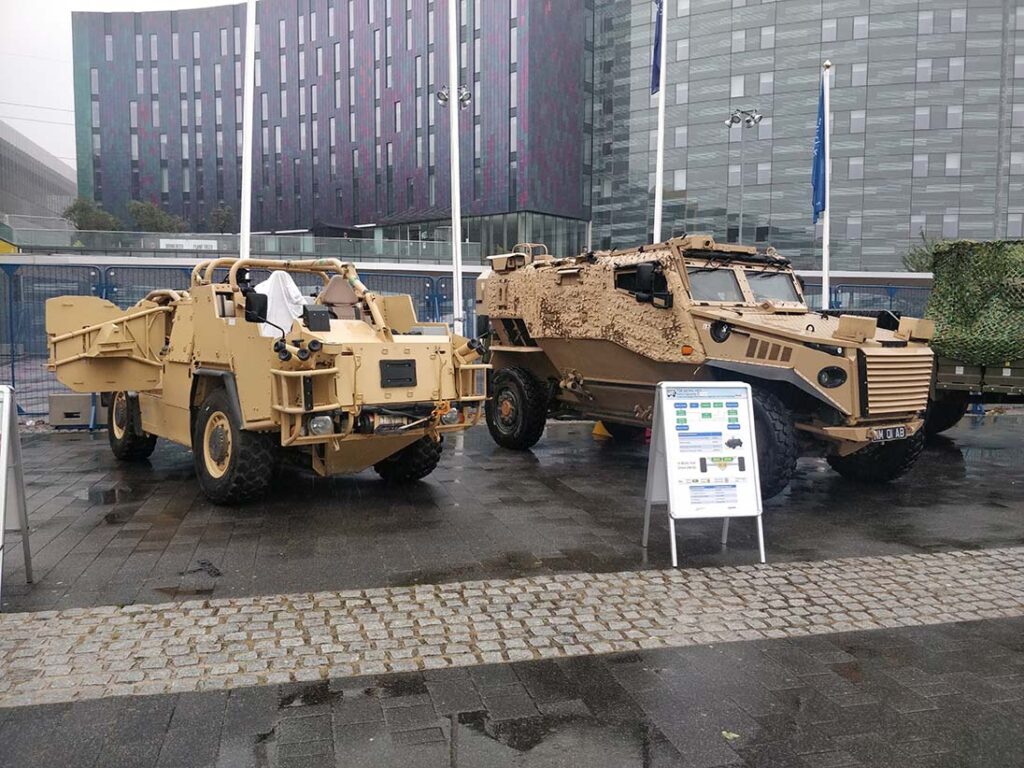 A HED-powered Jackal 2 4×4 high-mobility patrol vehicle and Foxhound 4×4 protected patrol vehicle on display at the DSEI defence exhibition in London in September 2021. Along with a HED-powered MAN HX60 4×4 6-tonne tactical truck, these vehicles were the focus of the British Army’s TD 6 project to experiment with HED technology on in-service platforms. [P Felstead]
