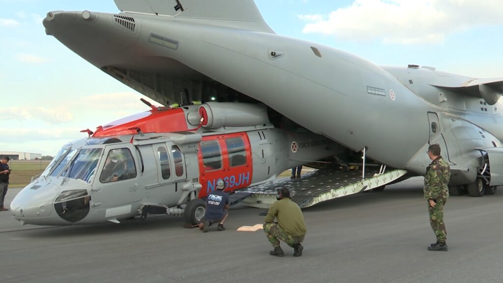 The KC-390's cargo system was built to give loadmasters flexibility, and it can transport helicopters like the Black Hawk without removing its rotor heads. (Photo by the Portuguese Air Force)