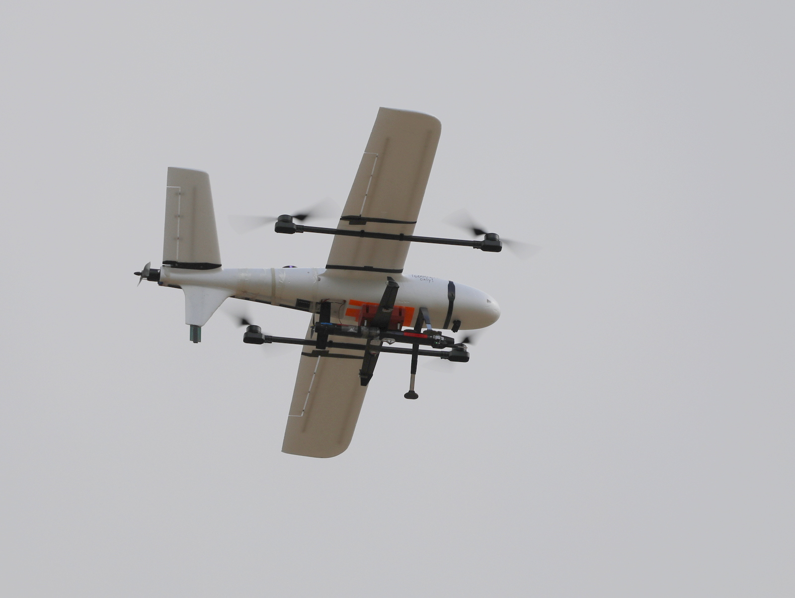 A mothership drone carries a Nordic Air Defense Kreuger 100 interceptor drone at the Sēlija testing range in central Latvia on May 26, 2026. (Rudy Ruitenberg/staff)