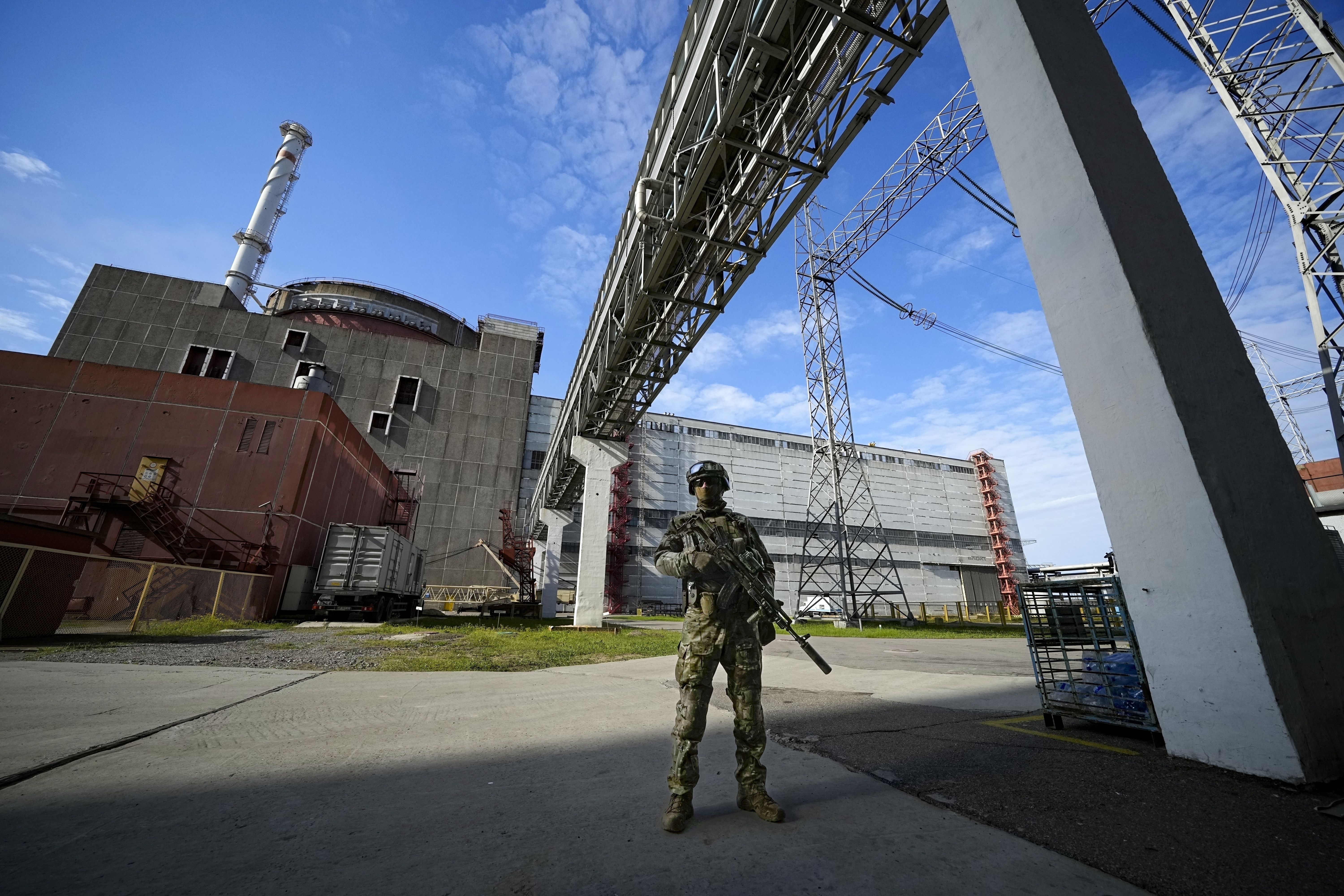A Russian soldier guards an area of the Zaporizhzhia Nuclear Power Station in 2022. (AP Photo)