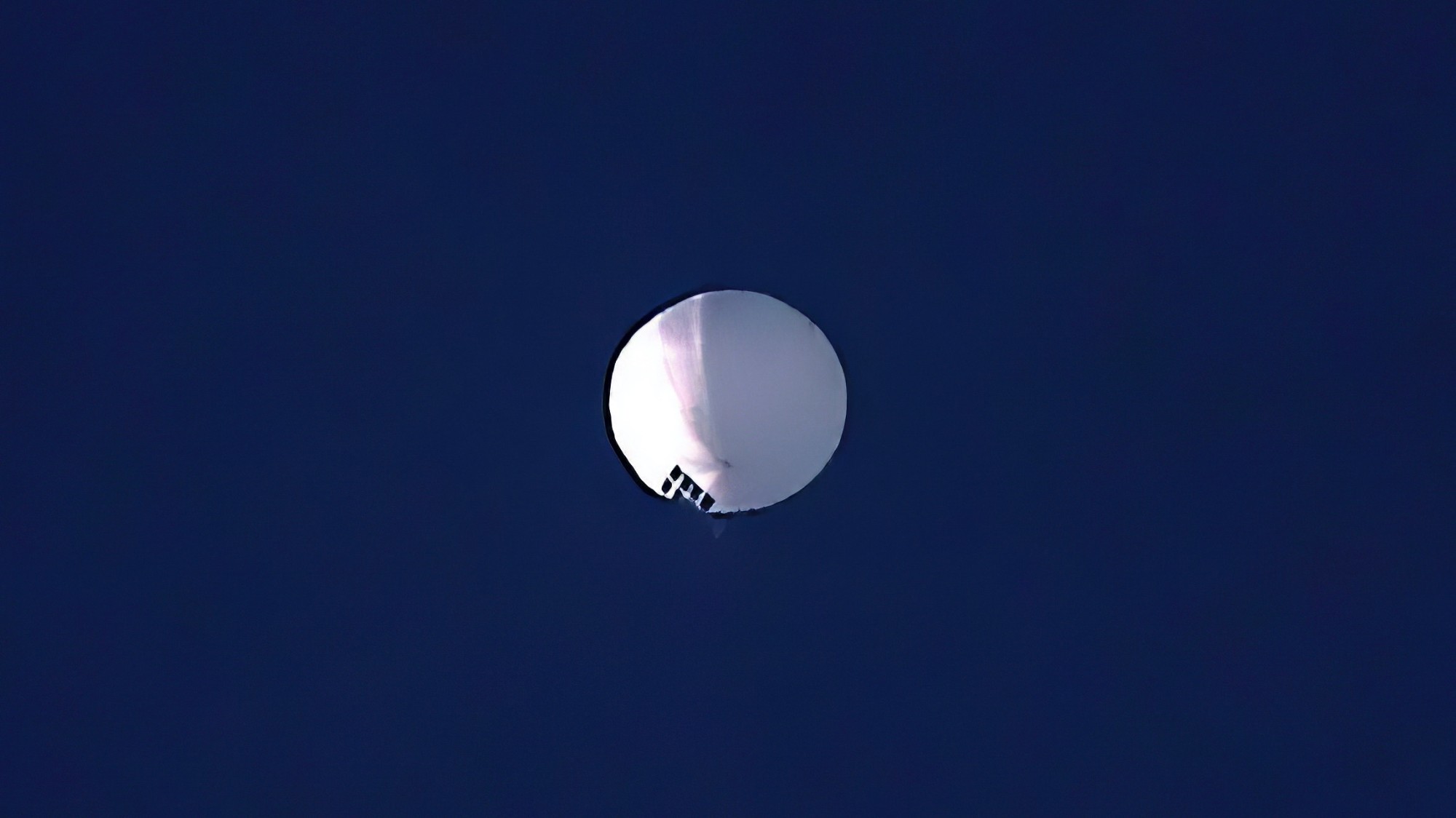 A high-altitude Chinese surveillance balloon floats over Billings, Montana, on Feb. 1, 2023. (Larry Mayer/The Billings Gazette via AP)