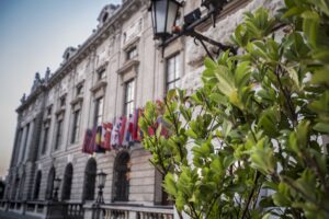 The Hofburg in Vienna, home to the OSCE Permanent Council. In total the OSCE has 57 participating states, as confirmed by the flags outside the Hofburg. (Image: OSCE)