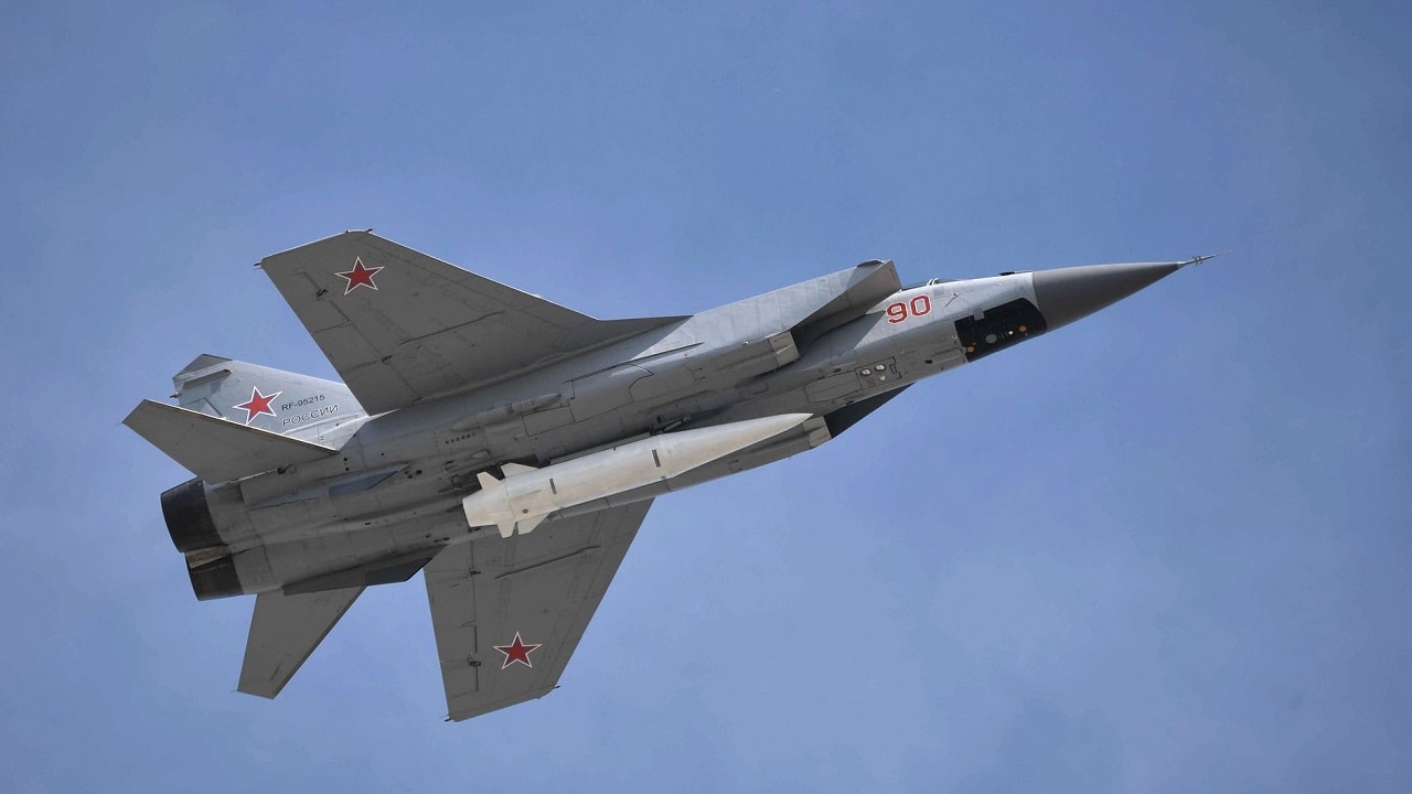 MiG-31K Foxhound in flight carrying Kinzhal hypersonic missile Russian Aerospace Forces