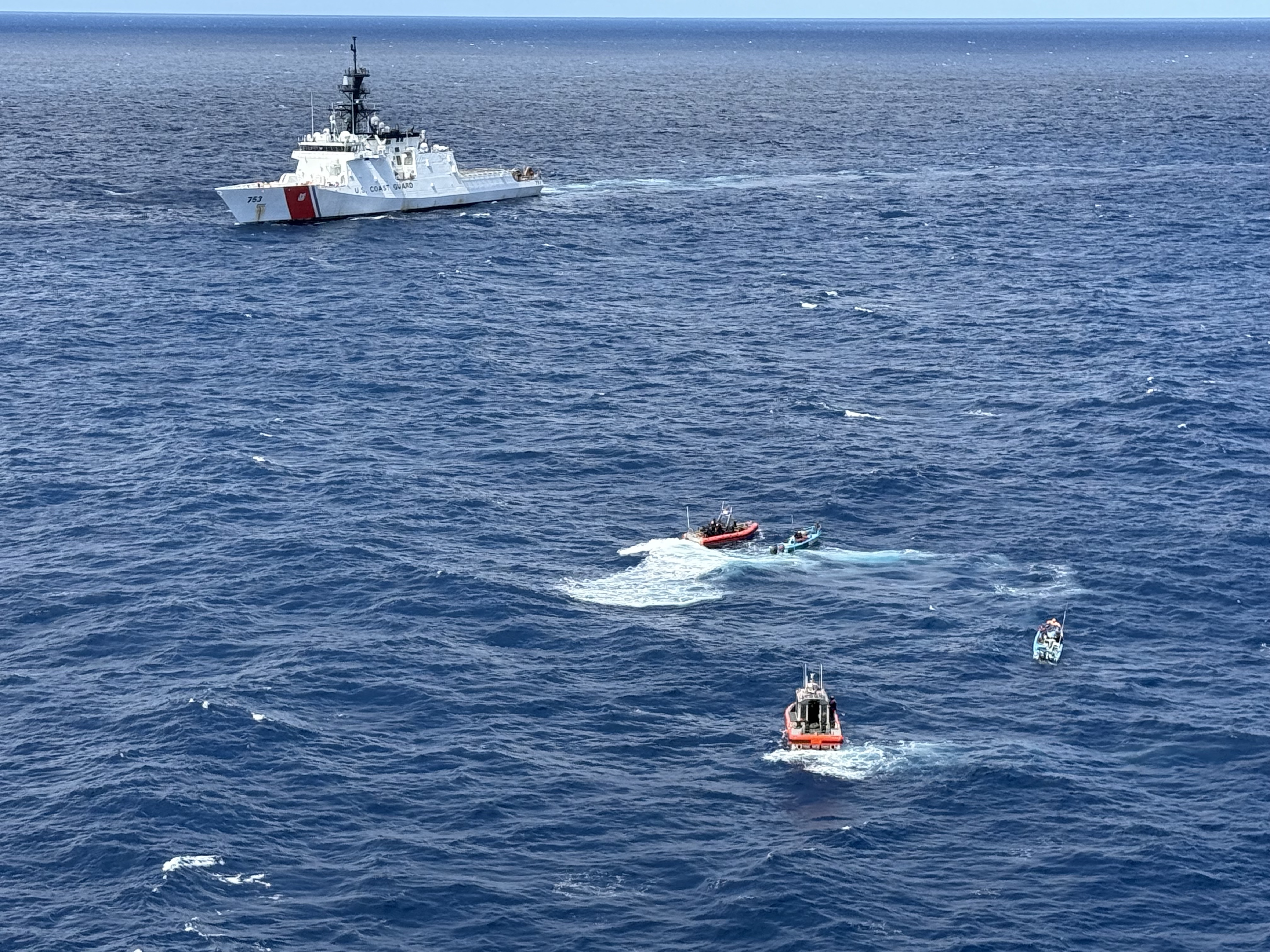 The U.S. Coast Guard cutter Hamilton intercepts two suspected drug smuggling boats this summer. (U.S. Coast Guard)