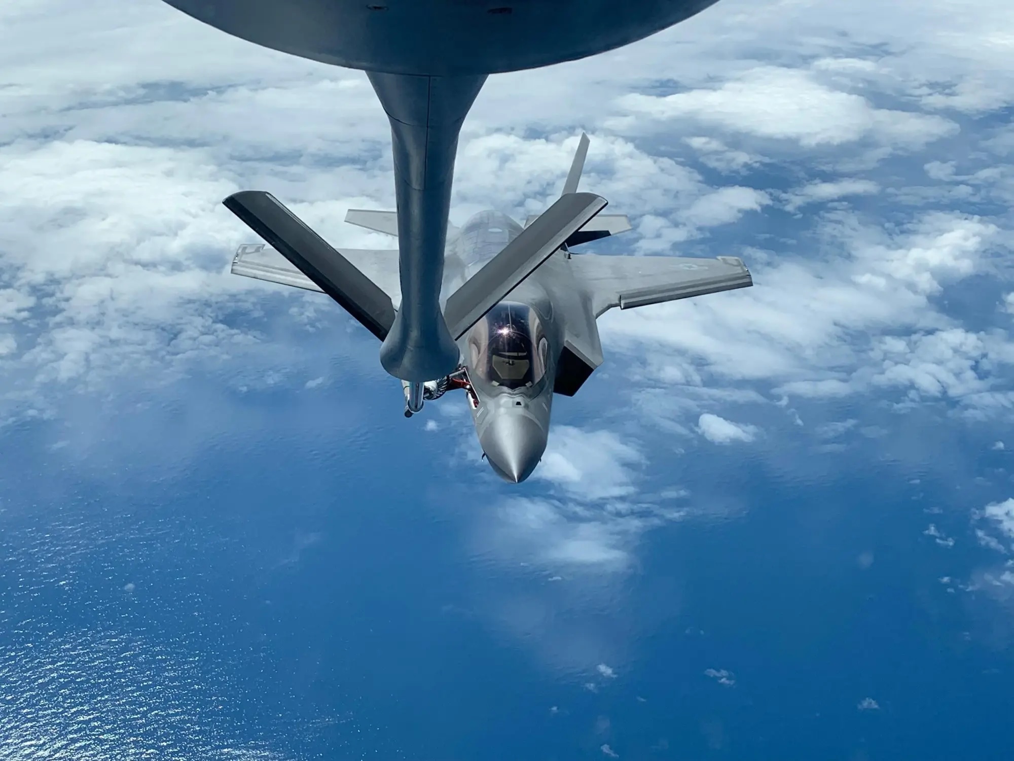 The author, a pilot in the Marines, refueling from a KC-135 “Iron Maiden” over the Pacific Ocean. (Photo courtesy of Evan Slusser)