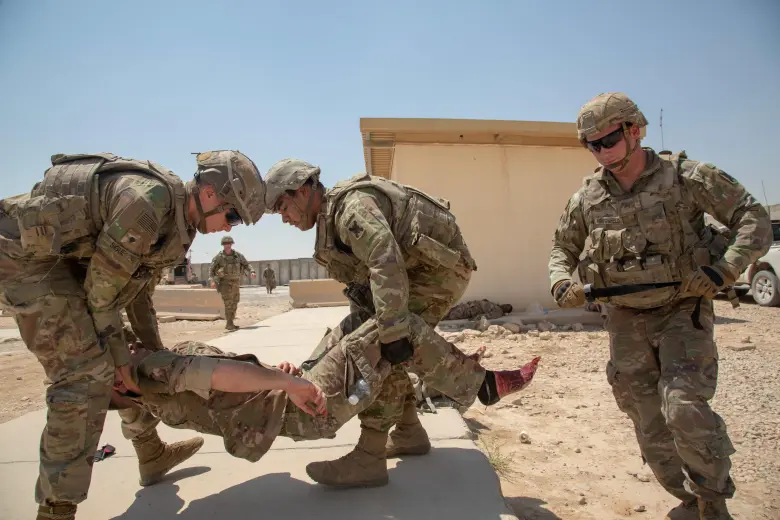 Combat medics participate in a combined joint mass casualty exercise at Al Asad Air Base in western Iraq, which had been the target of drone and rocket attacks in August 2021. (Photo by U.S. Army Spc. Clara Soria-Hernandez)