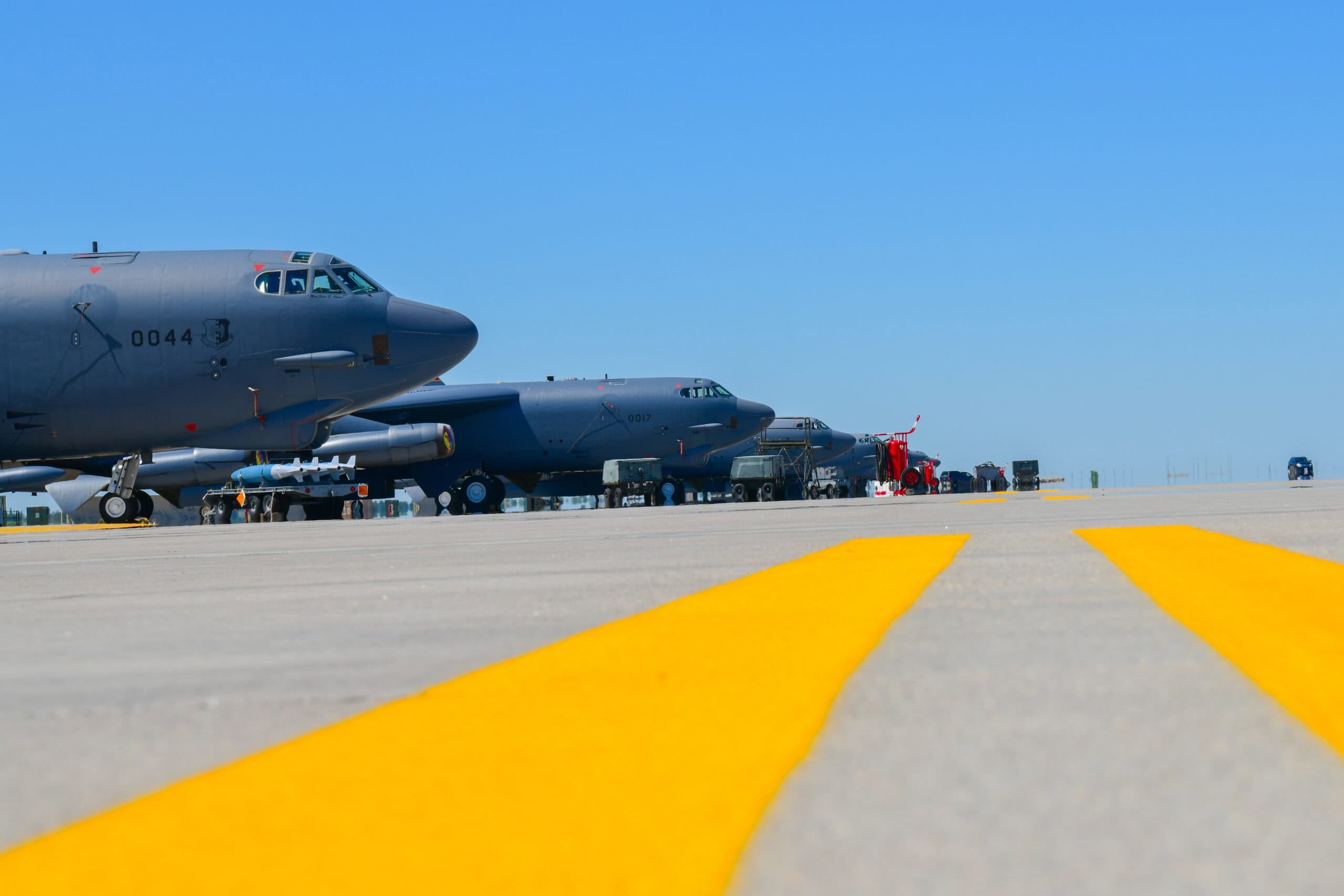 Multiple B-52H Stratofortresses sit parked at the flight line on Minot Air Force Base, North Dakota, Aug. 8, 2022. The B-52 bomber can carry approximately 70,000 pounds of bombs, mines and missiles. (U.S. Air Force photo by Airman Alysa Knott)