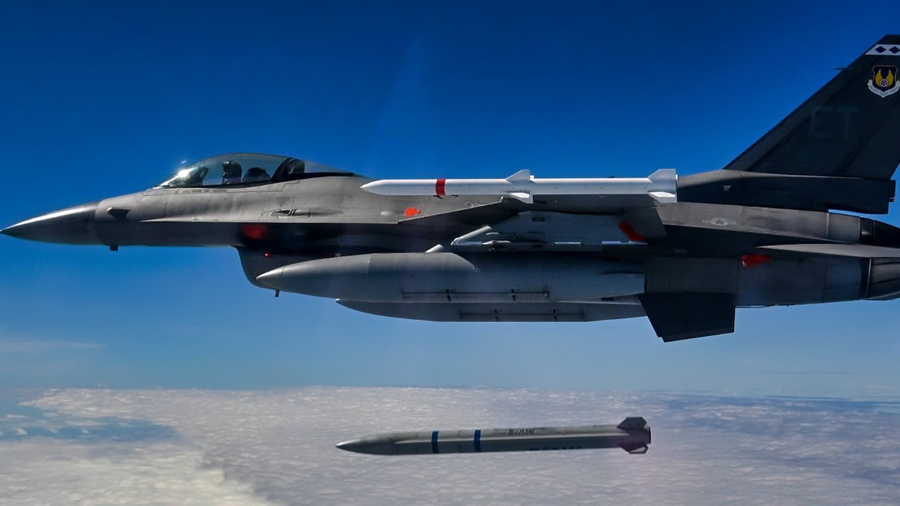 A 40th Flight Test Squadron F-16 Fighting Falcon releases a Stand-in Attack Weapon for the first time Nov. 7 at Eglin Air Force Base, Florida. The mission marked the first time the weapon was successfully released from an aircraft. (U.S. Air Force photo by Staff Sgt. Blake Wiles)