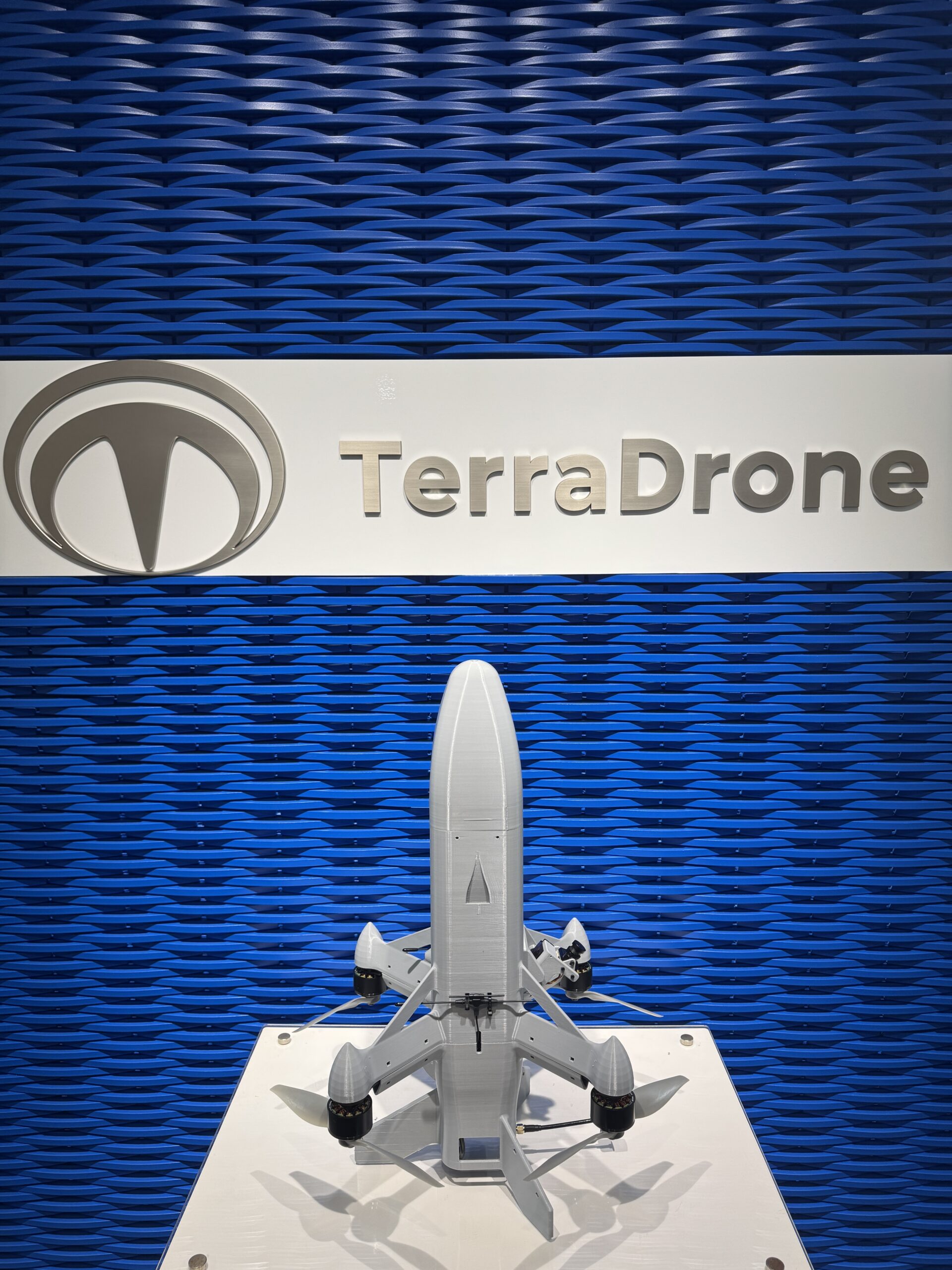 Terra Drone display with fixed-wing drone model for Japan interceptor program