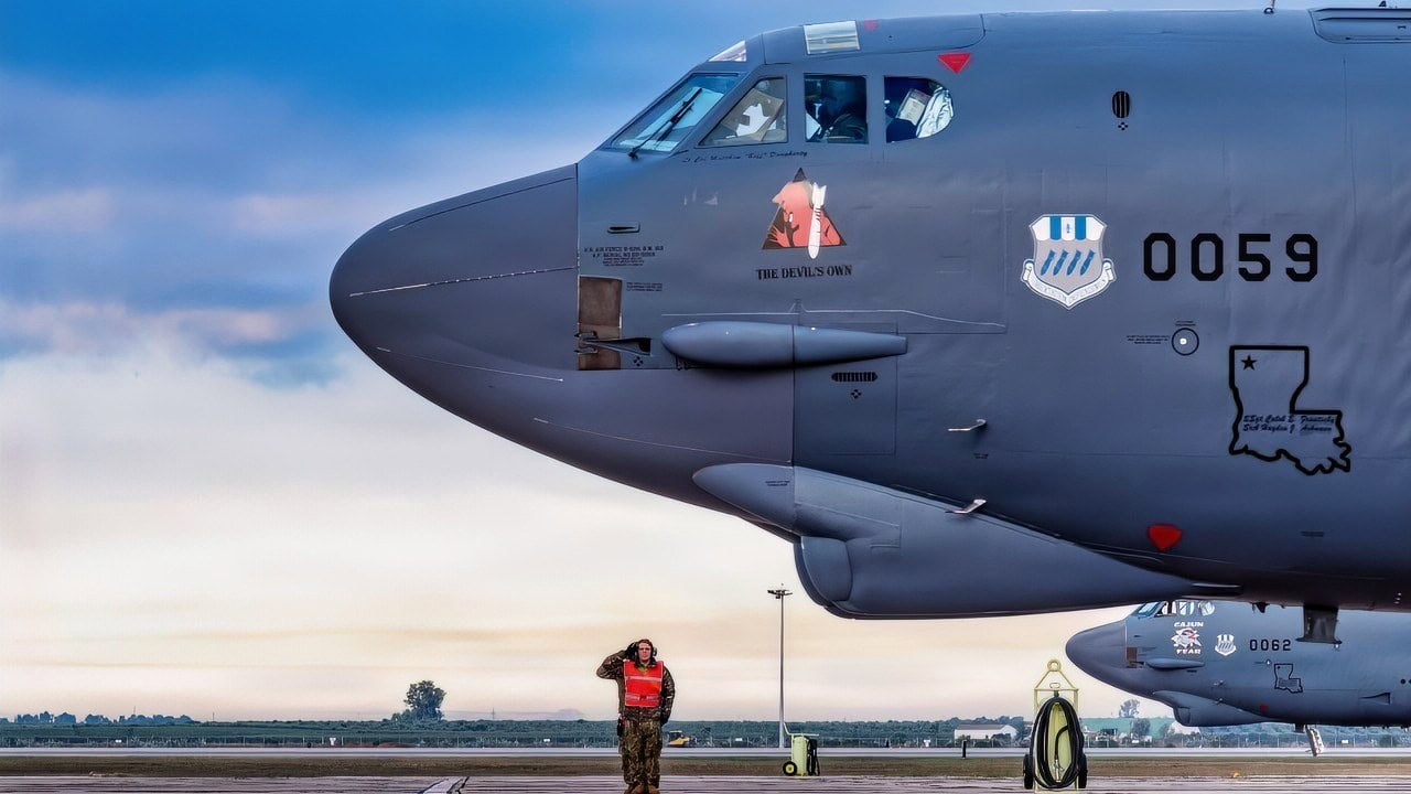 U.S. Airmen assigned to the 96th Expeditionary Bomber Generation Squadron salute the crew of a B-52H Stratofortress aircraft as they begin to taxi at Morón Air Base, Spain, Nov. 19, 2025, as part of Bomber Task Force Europe 26-1. The ability of U.S. forces and equipment to operate in conjunction with those of our Allies and partners is critical to bolstering an extended network of capabilities to decisively meet the challenges of today and tomorrow. (U.S. Air Force photo by Tech. Sgt. Codie Trimble)