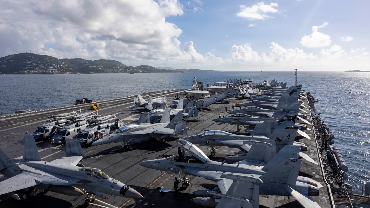 The world’s largest aircraft carrier, Ford-class aircraft carrier USS Gerald R. Ford (CVN 78), departs Saint Thomas, U.S. Virgin Islands, Dec. 6, 2025. U.S. military forces are deployed to the Caribbean in support of the U.S. Southern Command mission, Department of War-directed operations, and the president’s priorities to disrupt illicit drug trafficking and protect the homeland. (U.S. Navy photo)
