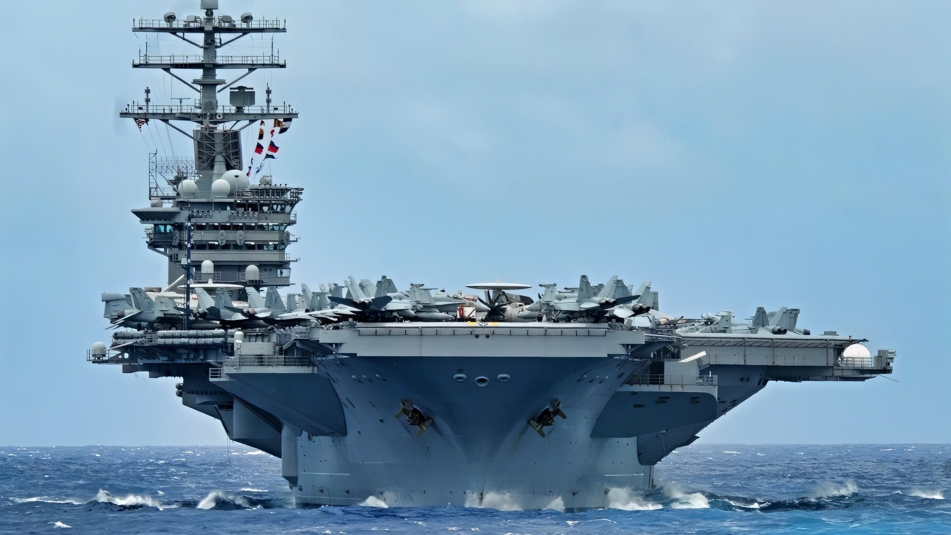 (July 18, 2012) - The aircraft carrier USS Nimitz (CVN 68) moves into formation for a photo exercise during the Great Green Fleet Demonstration as part of Rim of the Pacific (RIMPAC) 2012. Nimitz is currently underway participating in RIMPAC. Twenty-two nations, more than 40 ships and submarines, more than 200 aircraft and 25,000 personnel are participating in RIMPAC exercise from Jun. 29 to Aug. 3, in and around the Hawaiian Islands. The world’s largest international maritime exercise, RIMPAC provides a unique training opportunity that helps participants foster and sustain the cooperative relationships that are critical to ensuring the safety of sea lanes and security on the world’s oceans. RIMPAC 2012 is the 23rd exercise in the series that began in 1971. (U.S. Navy photo by Mass Communication Specialist 2nd Class Eva-Marie Ramsaran/RELEASED)