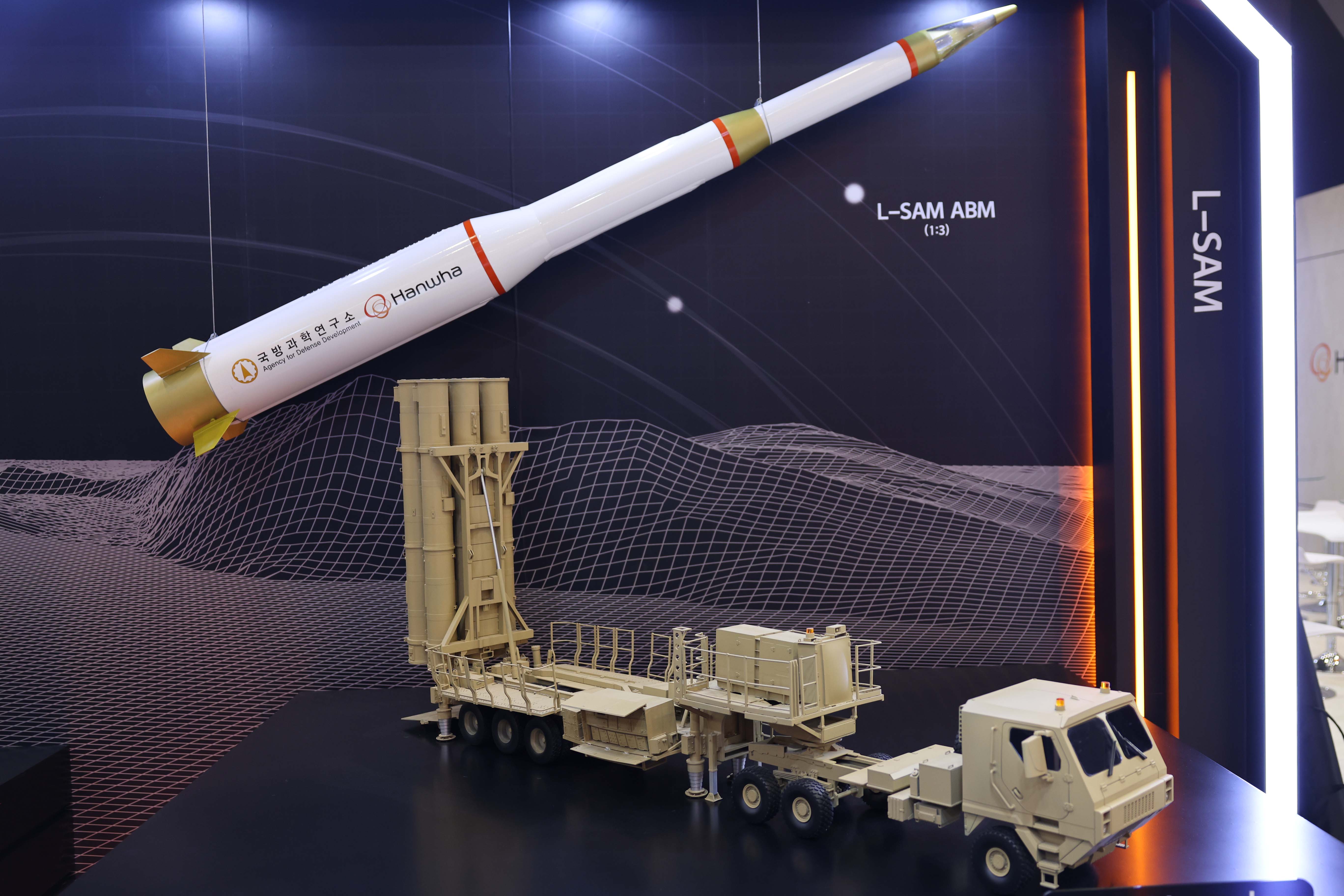 South Korea's Hanwha advertised its L-SAM air defense system at the Land Forces 2026 exhibition in Perth, Australia, in early October 2026. (Gordon Arthur)