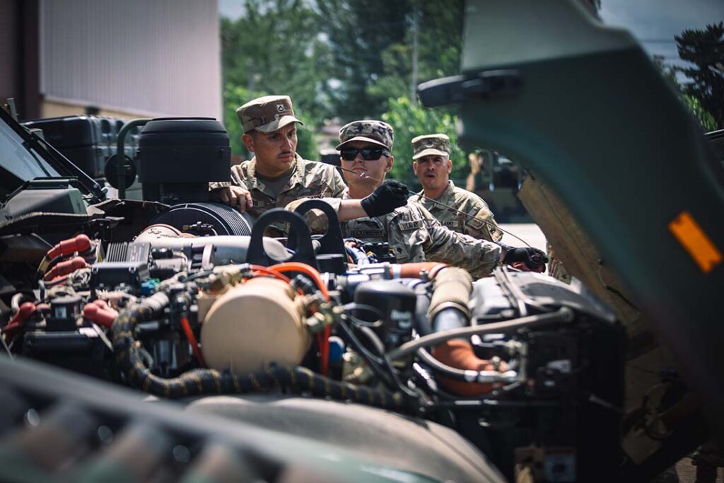 US Army Soldiers carry out Preventive Maintenance Checks and Services (PMCS) on a group of Joint Light Tactical Vehicles (JLTVs) in support of a deployment readiness exercise at Camp Carroll, South Korea, on 27 July 2024. [US Army/Sgt Eric Kestner]