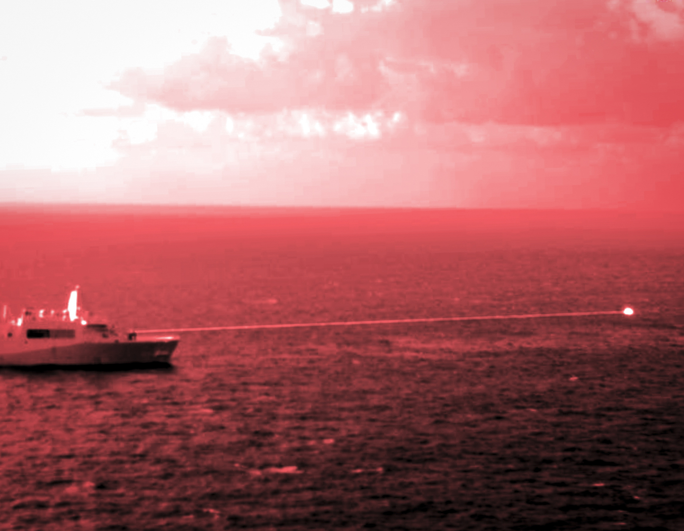 Amphibious transport dock ship USS Portland conducts a high-energy laser weapon system demonstration in the Gulf of Aden, December 2021. (Staff Sgt. Donald Holbert/U.S. Marine Corps)
