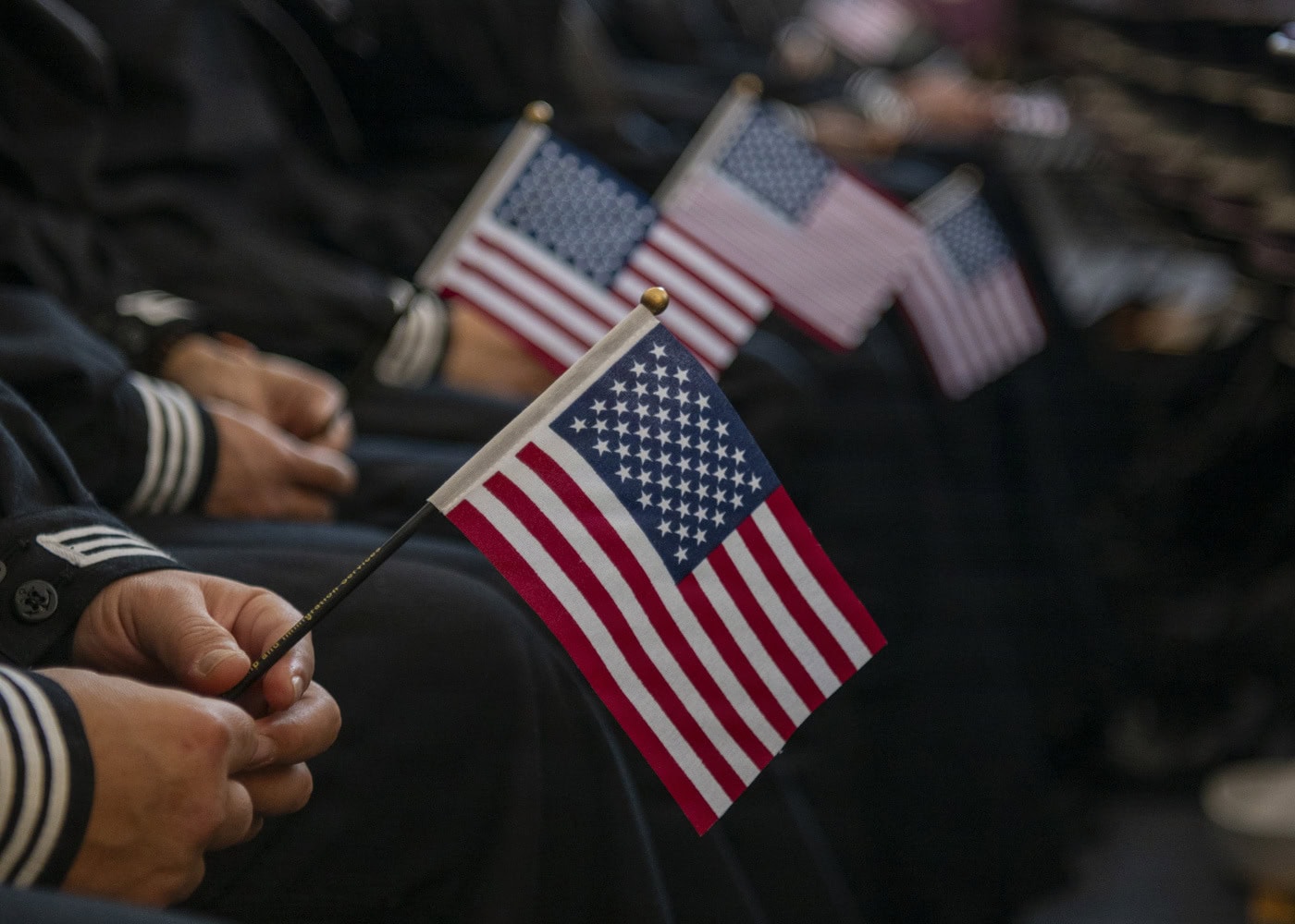 (Jan. 22, 2026) -- Recruits take the Naturalization Oath of Allegiance to the United States of America during a naturalization ceremony inside the Recruit Memorial Chapel onboard Recruit Training Command (RTC) on January 22, 2026. Training is approximately nine weeks and all enlistees in the U.S. Navy begin their career at the command. More than 40,000 recruits train annually at the Navy's only boot camp. (U.S. Navy photo by Mass Communication Specialist 1st Class John Suits)