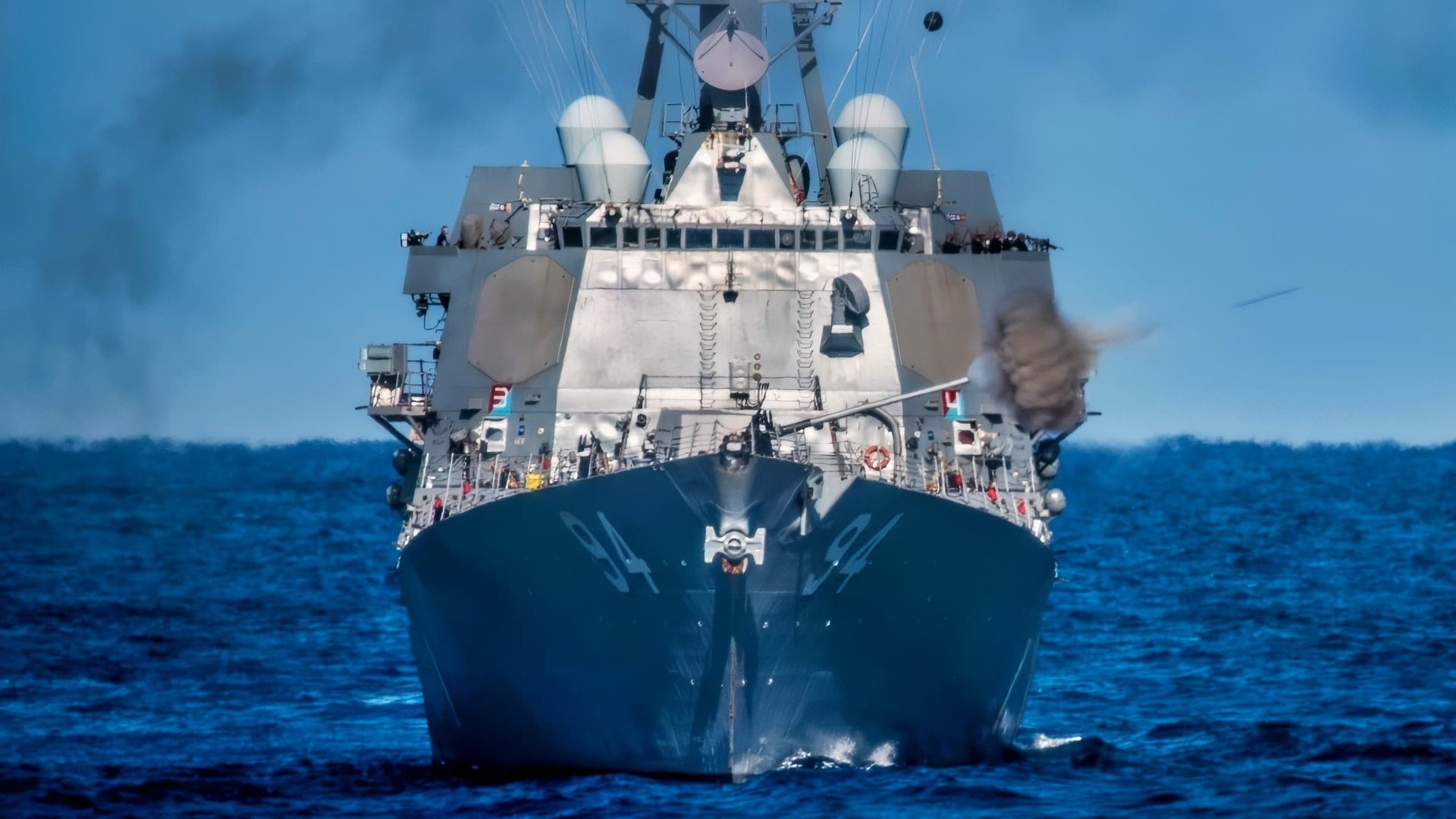 The guided missile destroyer USS Nitze (DDG 94) fires its MK-45 5 inch gun during a Surface Warfare Advanced Tactical Training (SWATT) exercise. Nitze is part of Destroyer Squadron (DESRON) 26 which supports Carrier Strike Group (CSG) 10. SWATT is led by the Naval Surface and Mine Warfighting Development Center (SMWDC) and is designed to increase warfighting proficiency, lethality, and interoperability or participating units. (U.S. Navy photo by Mass Communication Specialist 3rd Class Bryan Valek)