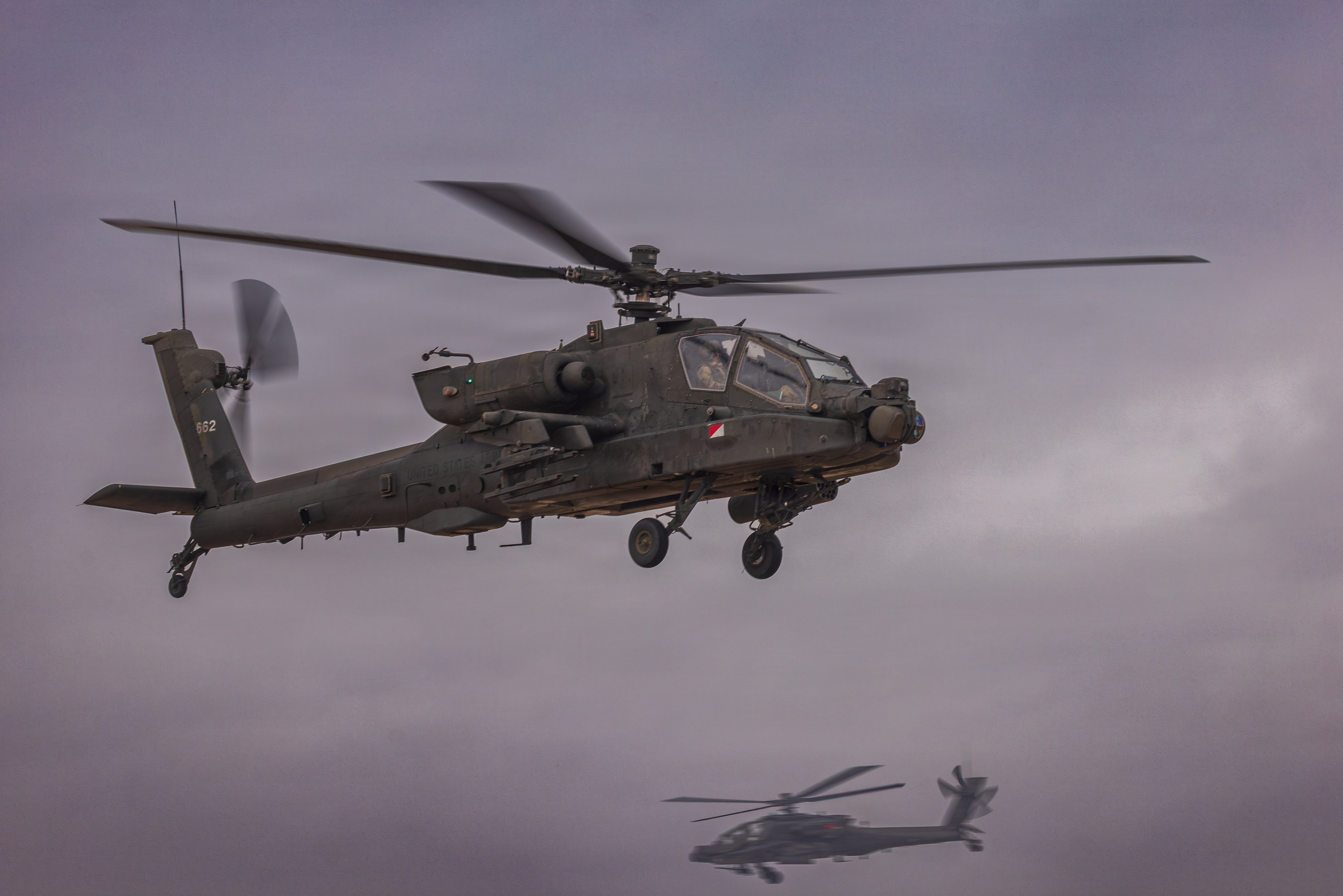 Two U.S. Army AH-64D Apache attack helicopter crews assigned to 4th Combat Aviation Brigade, Task Force Shikra, participate in Sky Shield live fire exercise at a training range in the U.S. Central Command area of responsibility, Dec. 9, 2025. Sky Shield is an Air Defense exercise that increases the ability of U.S. Forces and multinational partners to operate seamlessly in a joint, high-intensity environment – improving readiness, responsiveness, and interoperability. (U.S. Army photo by Joseph Kumzak)