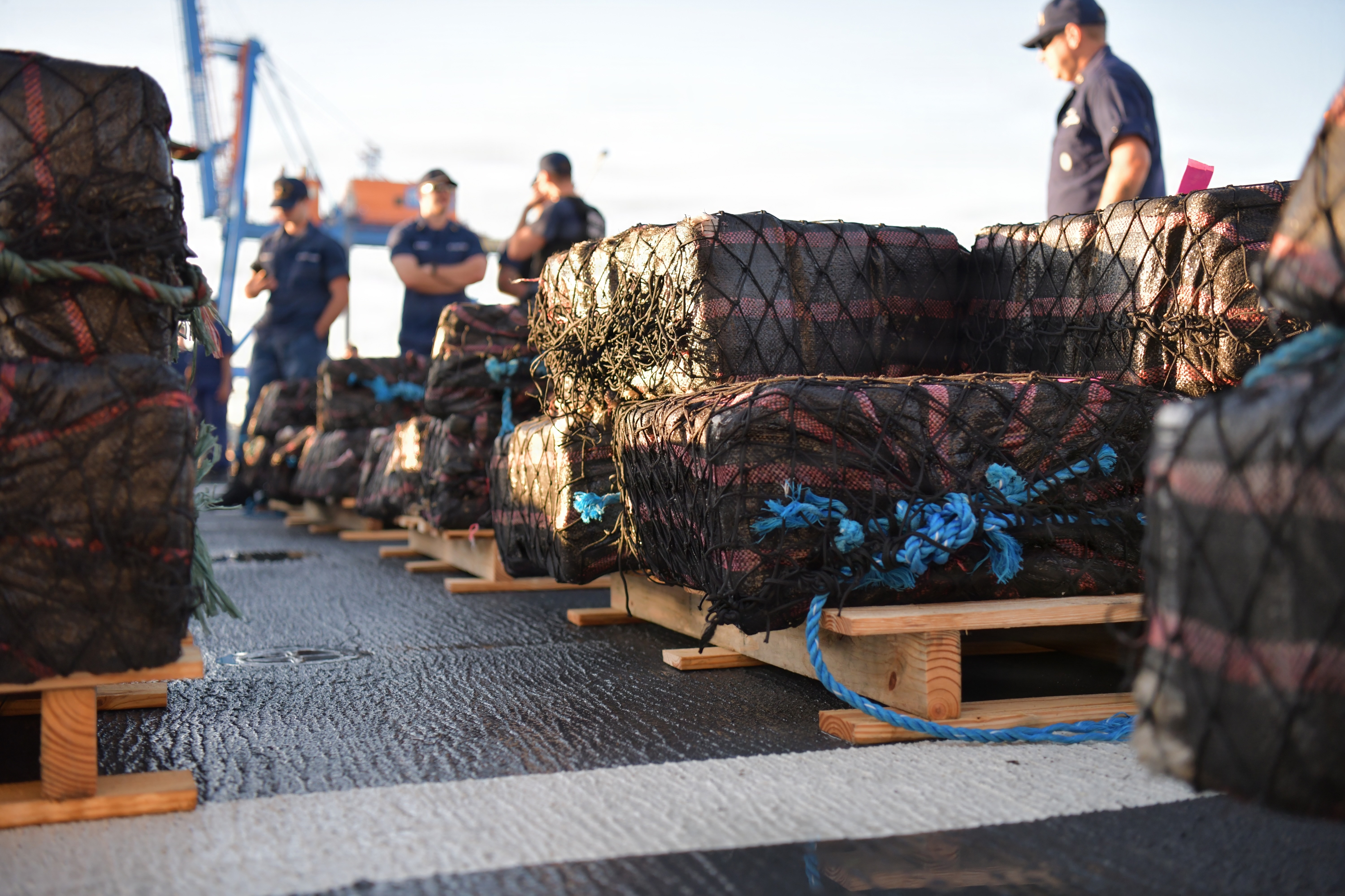 Narcotics seized in the eastern Pacific sit aboard the flight deck of the U.S. Coast Guard cutter James this December. (Petty Officer 1st Class Diana Sherbs/U.S. Coast Guard)