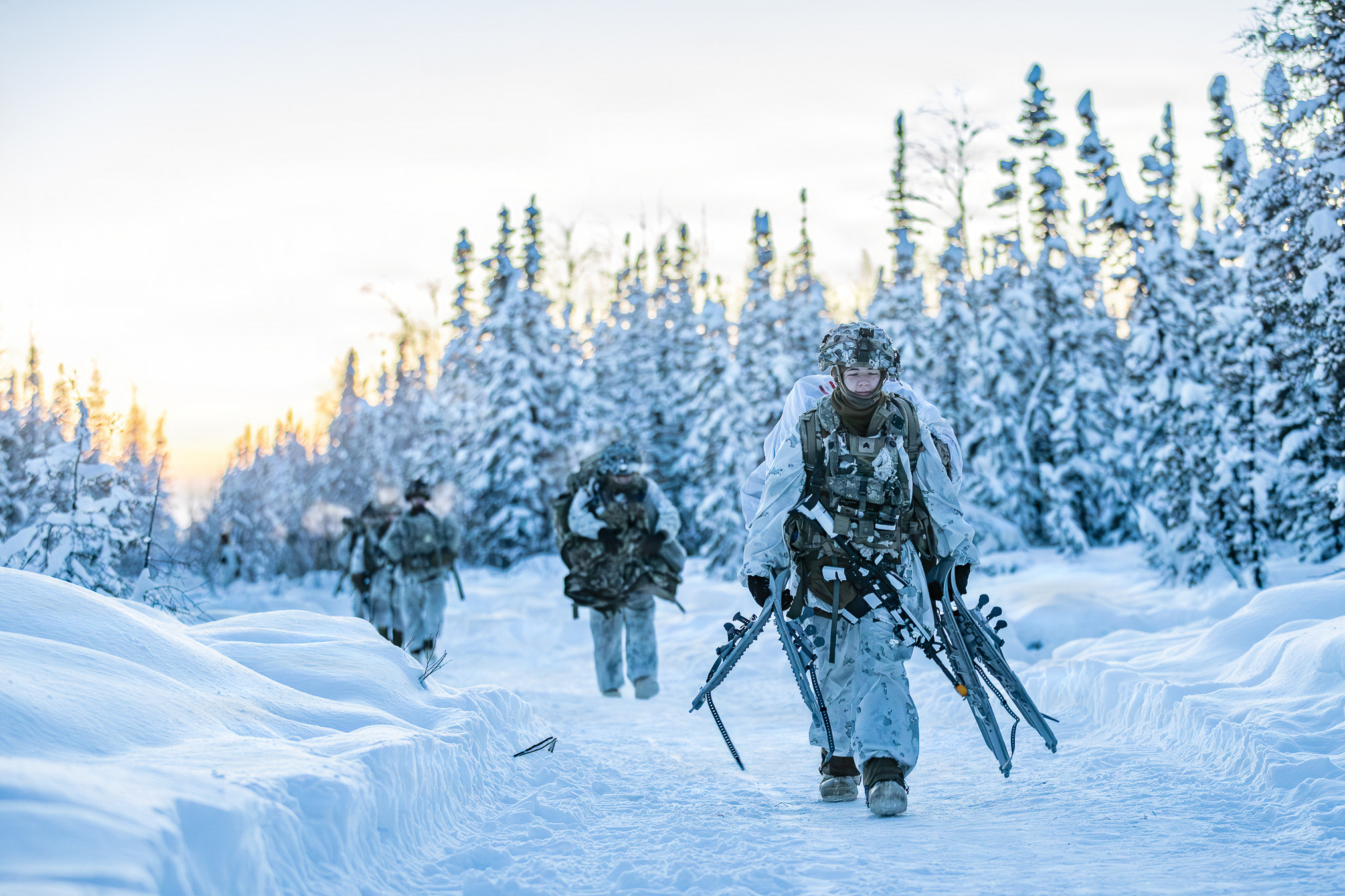 Troops conduct a foot march in the Yukon Training Area near Fairbanks, Alaska. (Spc. Cole Moore/U.S. Army)