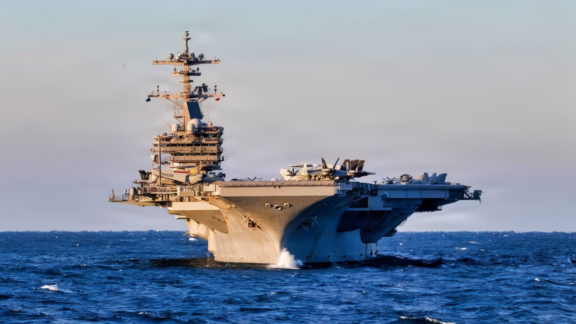 The Nimitz-class aircraft carrier USS George H.W. Bush (CVN 77) sails in the Atlantic Ocean, Feb. 6, 2026. The George H.W. Bush Carrier Strike Group is at sea as an integrated warfighting team. Composite Training Unit Exercise (COMPTUEX) is the Joint Force’s most complex integrated training event and prepares naval task forces for sustained high-end Joint and combined combat. Integrated naval training provides combatant commanders and America’s civilian leaders highly capable forces that deter adversaries, underpin American security and economic prosperity, and reassure Allies and partners. (U.S. Navy photo by Mass Communication Specialist 3rd Class John R. Farren)