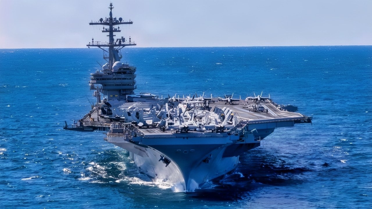 The Nimitz-class aircraft carrier USS George H.W. Bush transits the Atlantic Ocean, Feb. 8, 2026. The George H.W. Bush Carrier Strike Group is at sea training as an integrated warfighting team. Composite Training Unit Exercise (COMPTUEX) is the Joint Force’s most complex integrated training event and prepares naval task forces for sustained high-end Joint and combined combat. Integrated naval training provides combatant commanders and America’s civilian leaders highly capable forces that deter adversaries, underpin American security and economic prosperity, and reassure Allies and partners. (U.S. Navy photo by Mass Communication Specialist 2nd Class Jayden Brown)