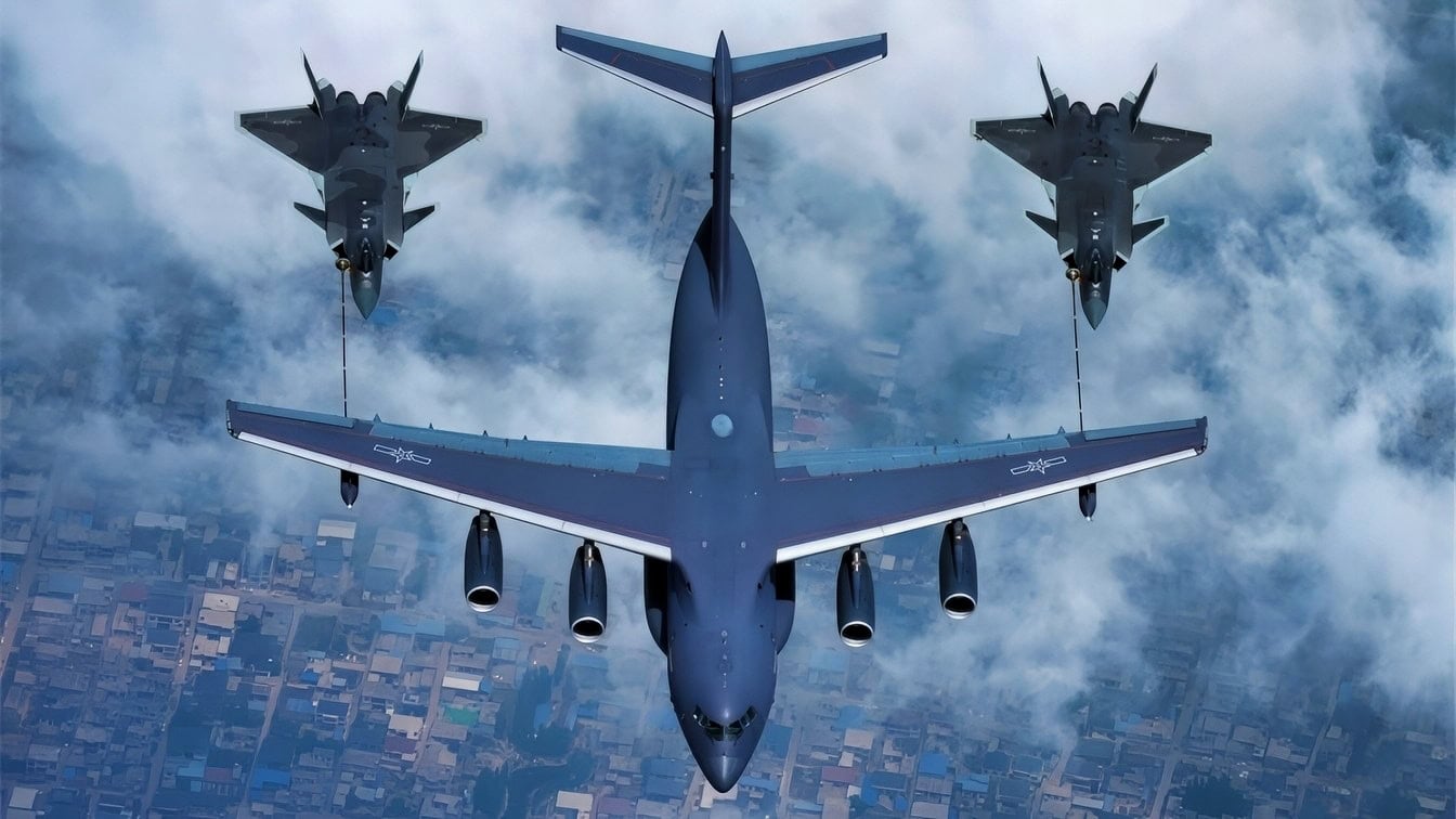 Chinese J-20 stealth fighters refueling from a Y-20-derived tanker over the Pacific