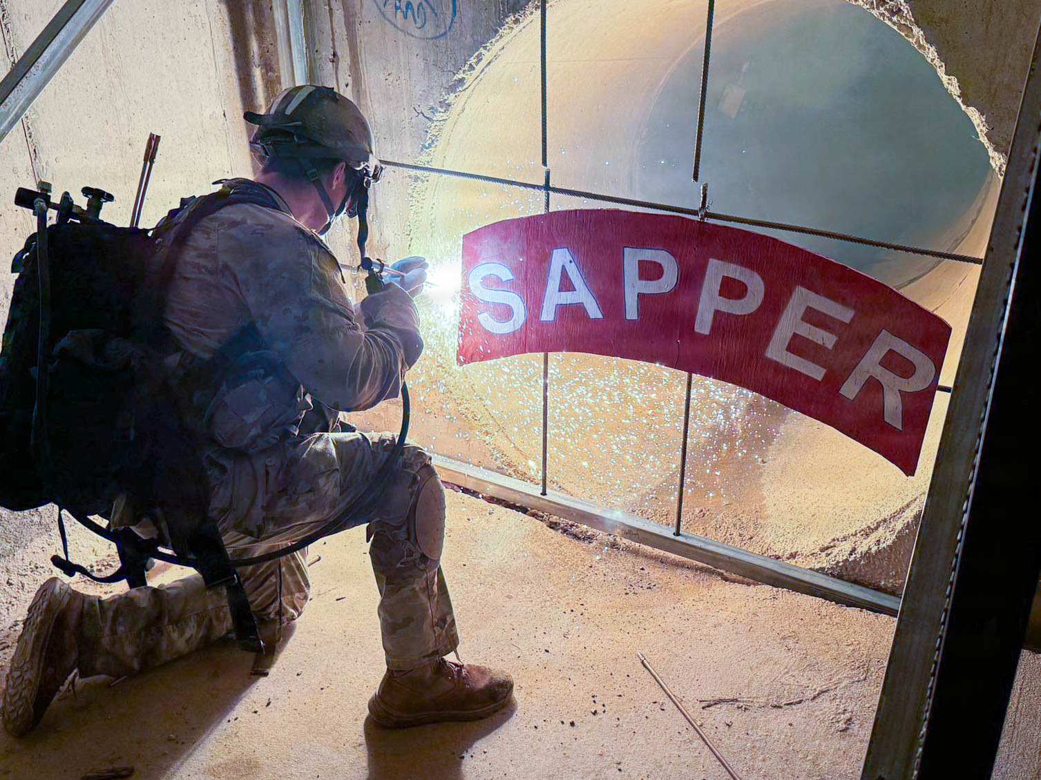A Sapper Leader Course student conducts a thermal breach at Fort Leonard Wood. (photo courtesy of the Sapper Training Company)