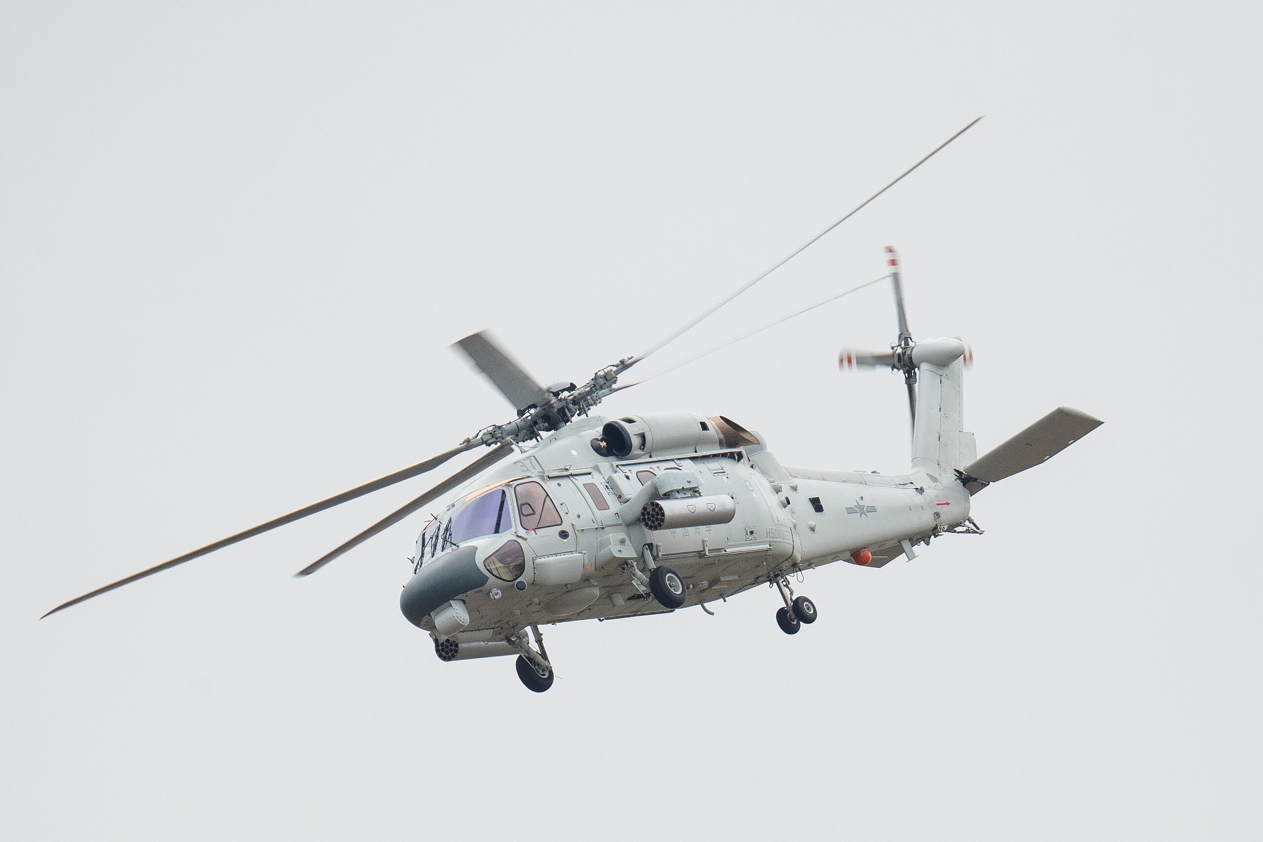 PLA Z-20 helicopter in flight with star insignia