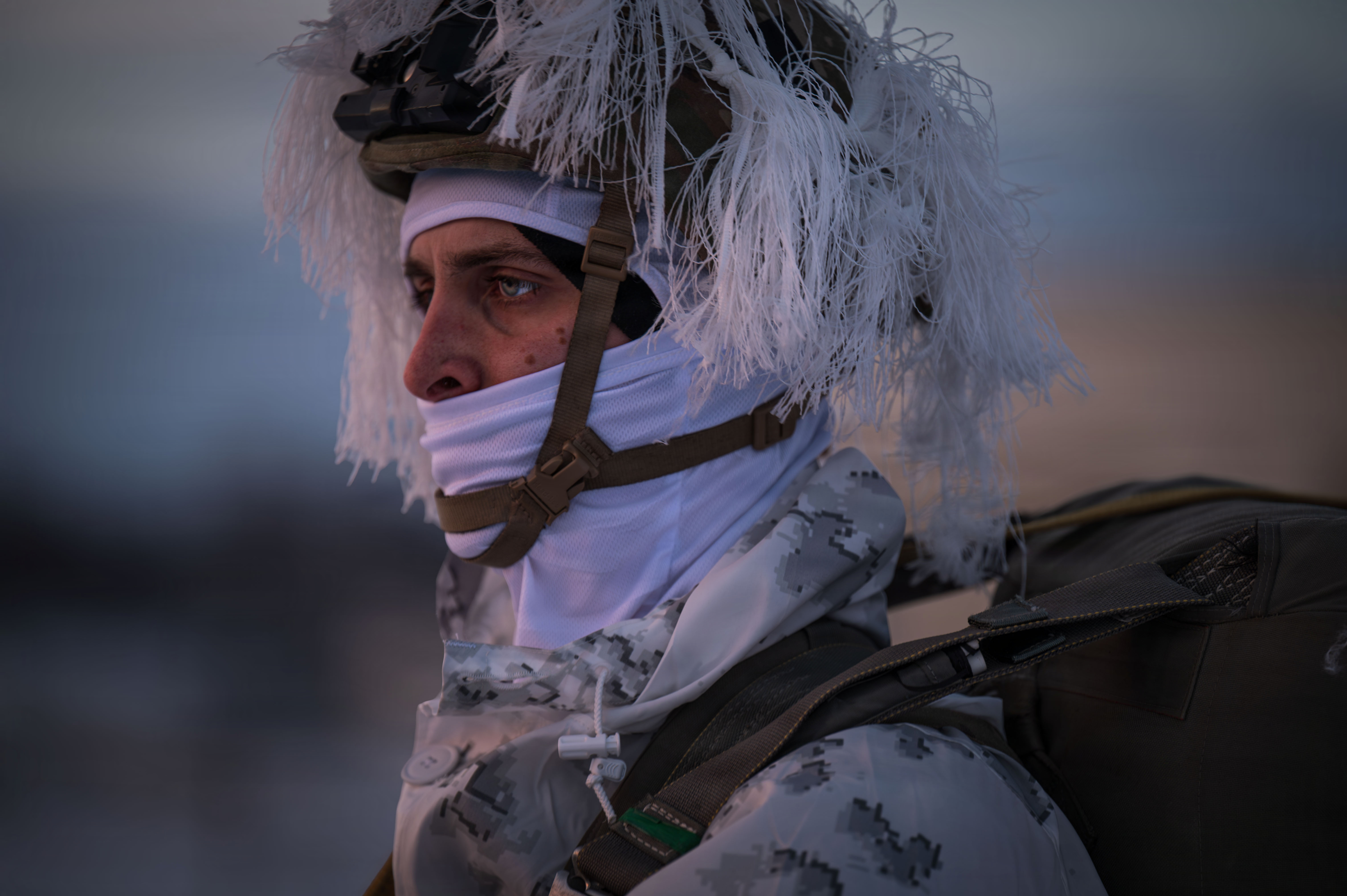 A paratrooper boards a U.S. Air Force C-130J Super Hercules. (Senior Airman Cayla Hunt/U.S. Air Force)