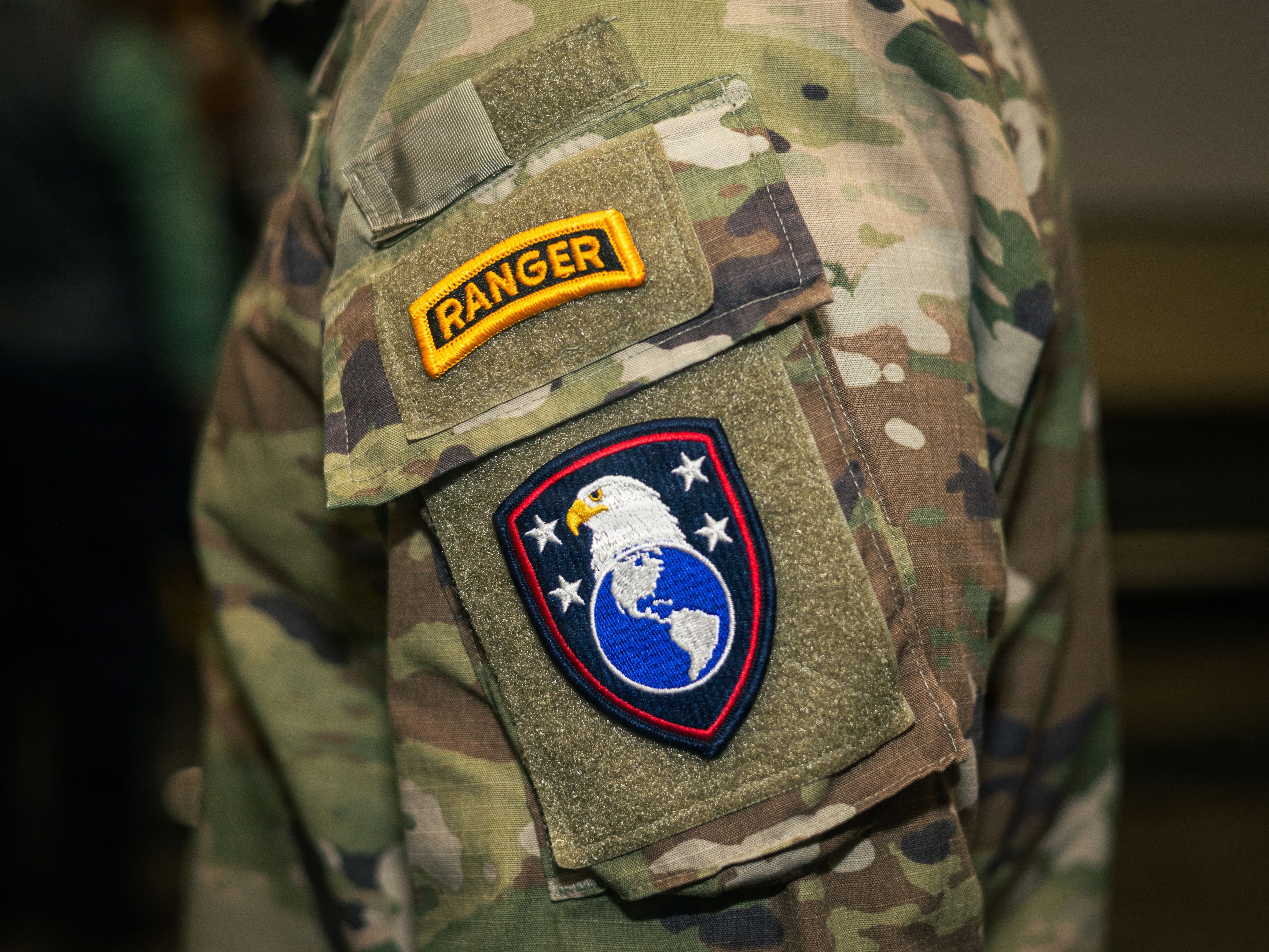 The new U.S. Army Western Hemisphere Command patch is displayed at the USAWHC activation at Fort Bragg, North Carolina, on Dec. 5, 2025. (Pfc. Alexis Fischer/U.S. Army)