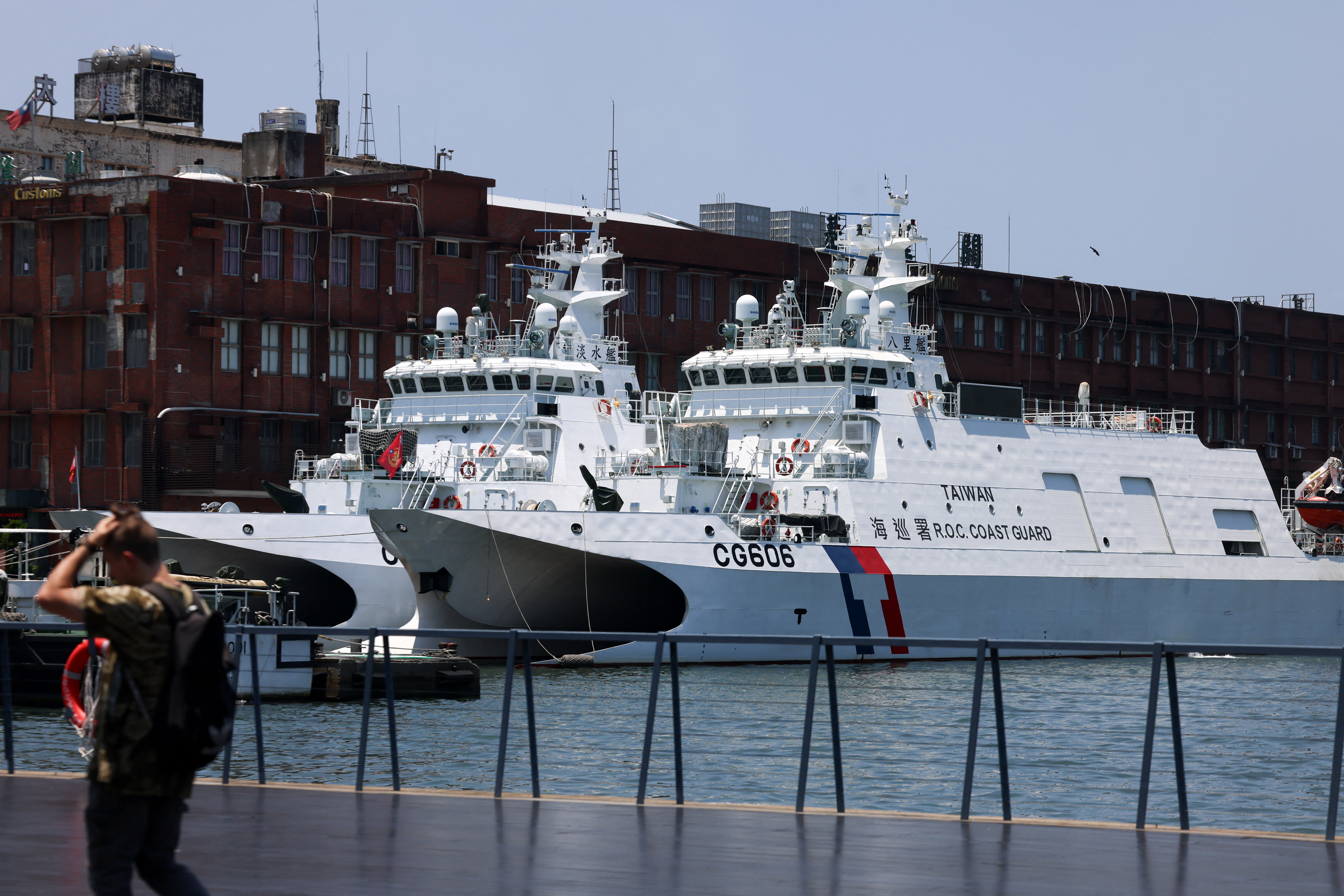 Taiwan Coast Guard vessels are moored at Keelung Port, Taiwan, on July 8, 2026. China has signaled its intent to maintain a new coast guard patrol east of Taiwan. (I-Hwa Cheng / AFP via Getty Images)
