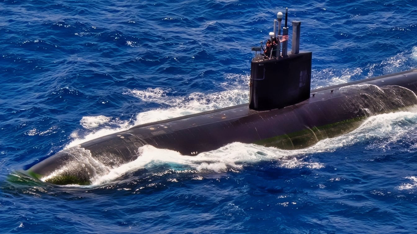 Virginia-class submarine USS North Carolina (SSN-777) sails during the at-sea phase of Exercise Rim of the Pacific (RIMPAC) 2024. Twenty-nine nations, 40 surface ships, three submarines, 14 national land forces, more than 150 aircraft and 25,000 personnel are participating in RIMPAC in and around the Hawaiian Islands, June 27 to Aug. 1. The world’s largest international maritime exercise, RIMPAC provides a unique training opportunity while fostering and sustaining cooperative relationships among participants critical to ensuring the safety of sea lanes and security on the world’s oceans. RIMPAC 2024 is the 29th exercise in the series that began in 1971. (U.S. Navy photo by Mass Communication Specialist 2nd Class Terrin Hartman)