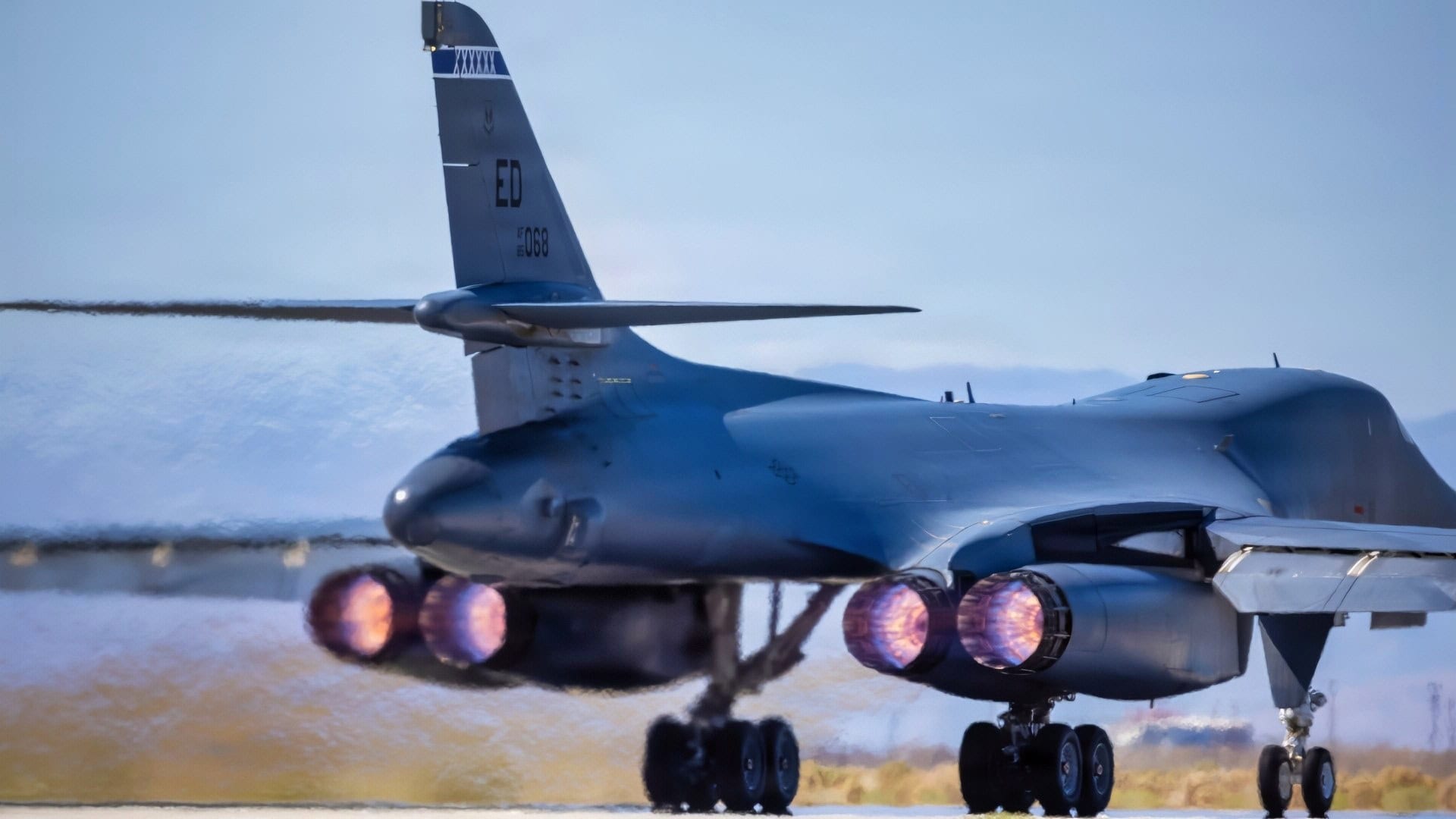A B-1B Lancer departs for a test mission at Edwards Air Force Base, California on September 11, 2025. The supersonic multi-mission heavy bomber continues developmental testing with the 419th Flight Test Squadron to increase lethality across several domains. The aircraft is helping bridge advanced capability for Global Strike Command ahead of the B-21 Raider's arrival. The 412th Test Wing at Edwards is the only installation to host all four USAF bomber aircraft. (U.S. Air Force photo by Todd Schannuth)