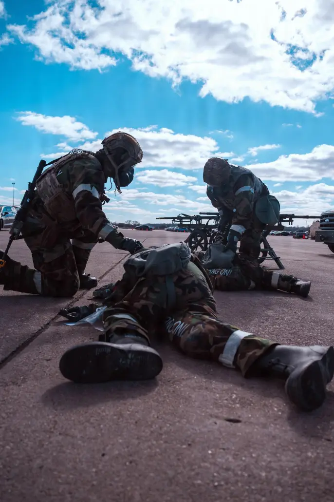 Airmen with the 155th Security Forces Squadron triage a casualty during a simulated drone attack at the Nebraska National Guard air base in Lincoln, Nebraska, in February 2026. (Photo by U.S. Air National Guard Senior Airman Jeremiah Johnson)