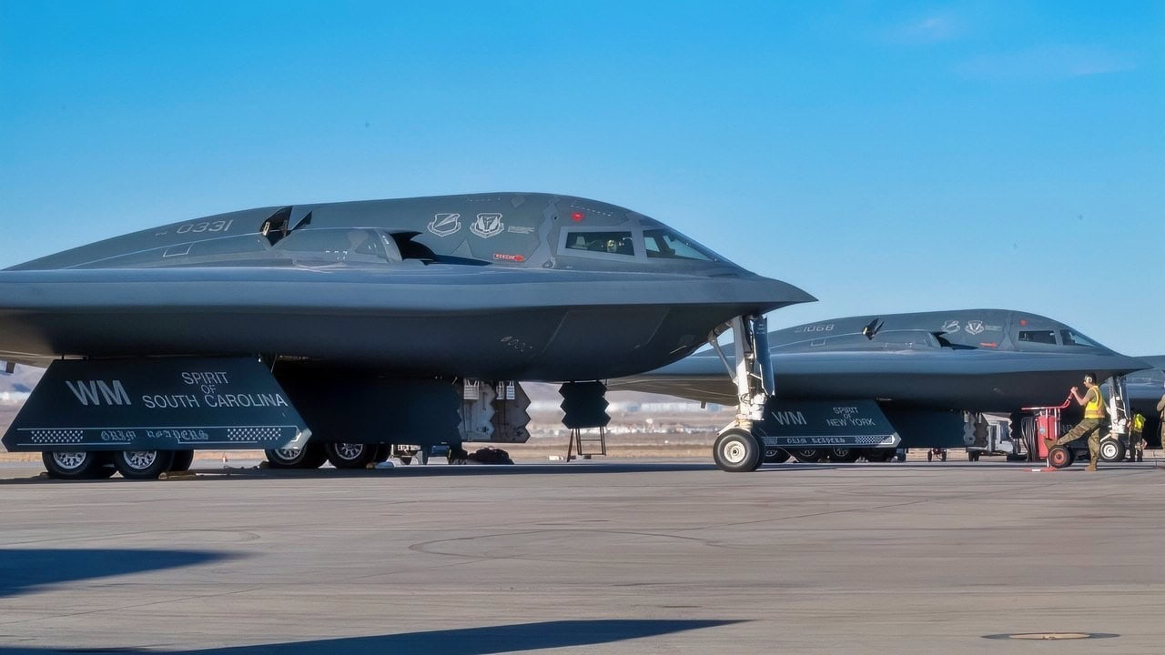 Three B-2 Spirit stealth bombers prepare for departure during Exercise Bamboo Eagle at Nellis Air Force Base, Nevada, Feb. 10, 2025. Bamboo Eagle incorporates multiple mission scenarios, preparing aircrews for complex operational challenges. (U.S. Air Force photo by Senior Airman Bryson Sherard.)