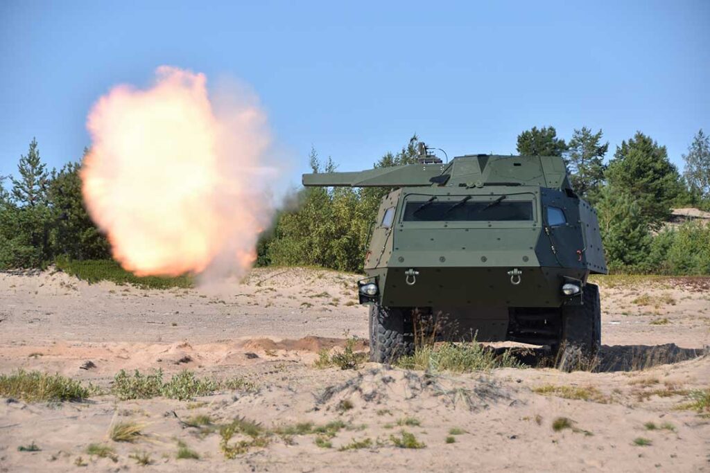 Patria’s CAVS NEMO mortar carrier combines the company’s 6×6 vehicle, mounted with its NEMO 120 mm turreted mortar system, seen here firing in direct-fire mode. [Patria]